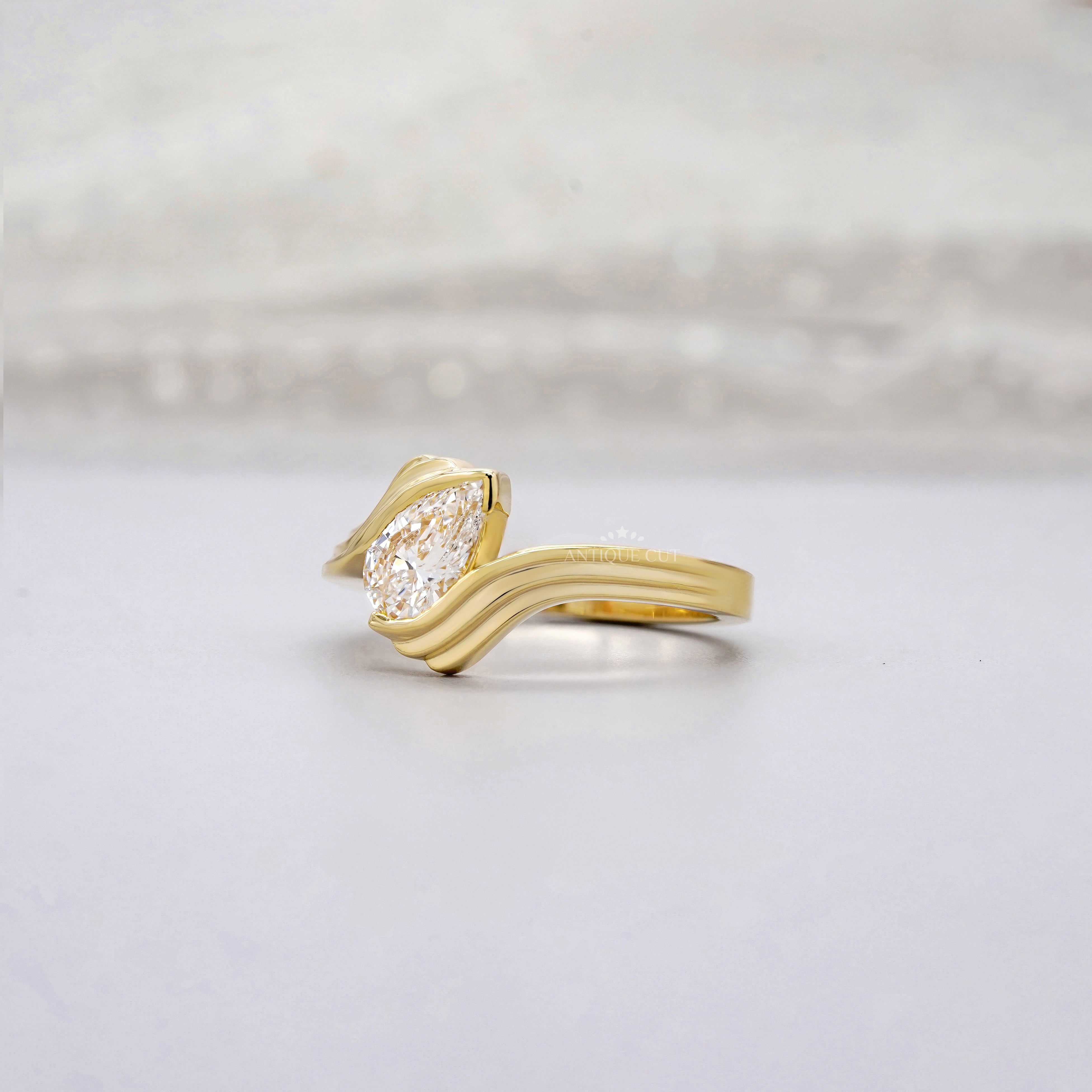 1.00ct Pear Lab Diamond Wave Solitaire Ring | Sculpted Yellow Gold | IGI Certified