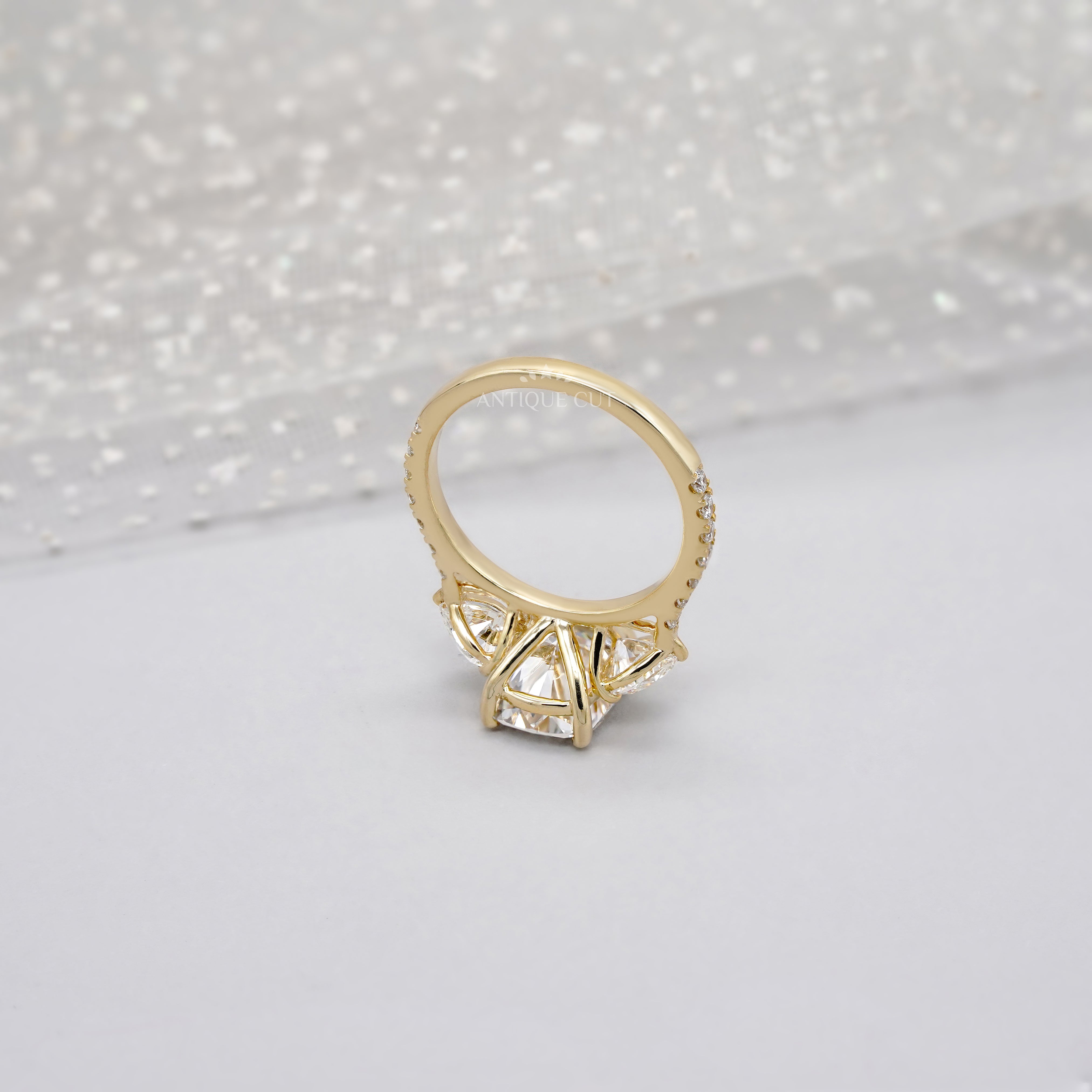 Cushion 3.90tcw Lab-Grown Diamond Three-Stone Ring | Heart & Round Side Stones | Yellow Gold