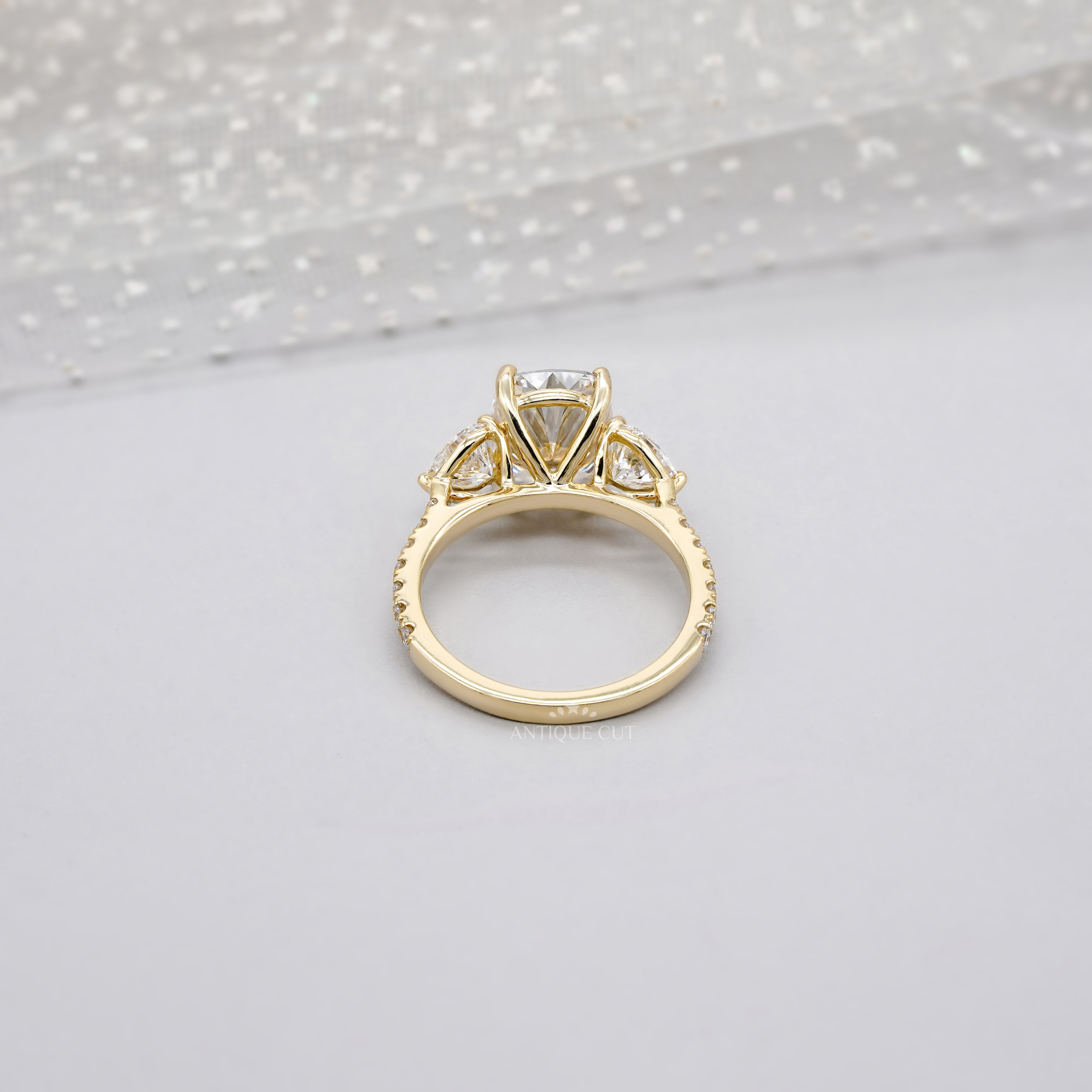 Cushion 3.90tcw Lab-Grown Diamond Three-Stone Ring | Heart & Round Side Stones | Yellow Gold