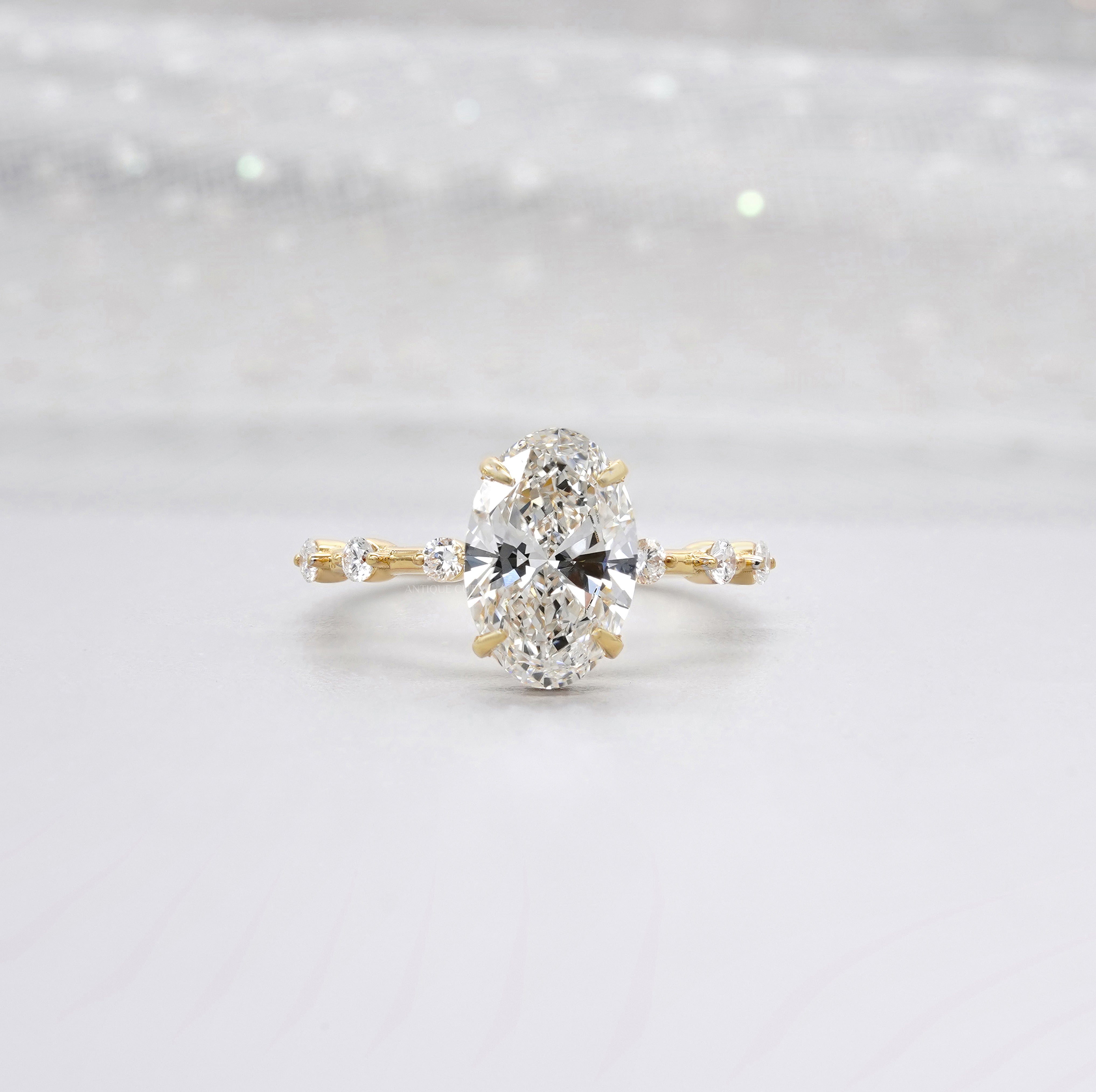Oval 2.30tcw Lab-Grown Diamond Engagement Ring | Yellow Gold Side Stones | IGI Certified