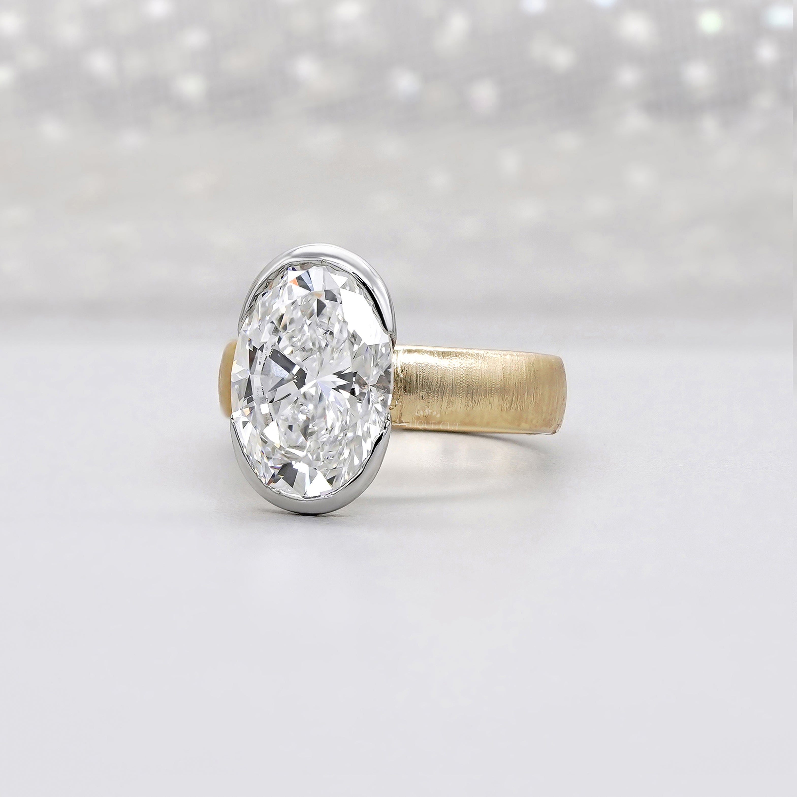 4ct Oval Lab Grown Diamond Bezel Engagement Ring | Two-Tone Matte Finish | IGI Certified D-E-F VVS–VS