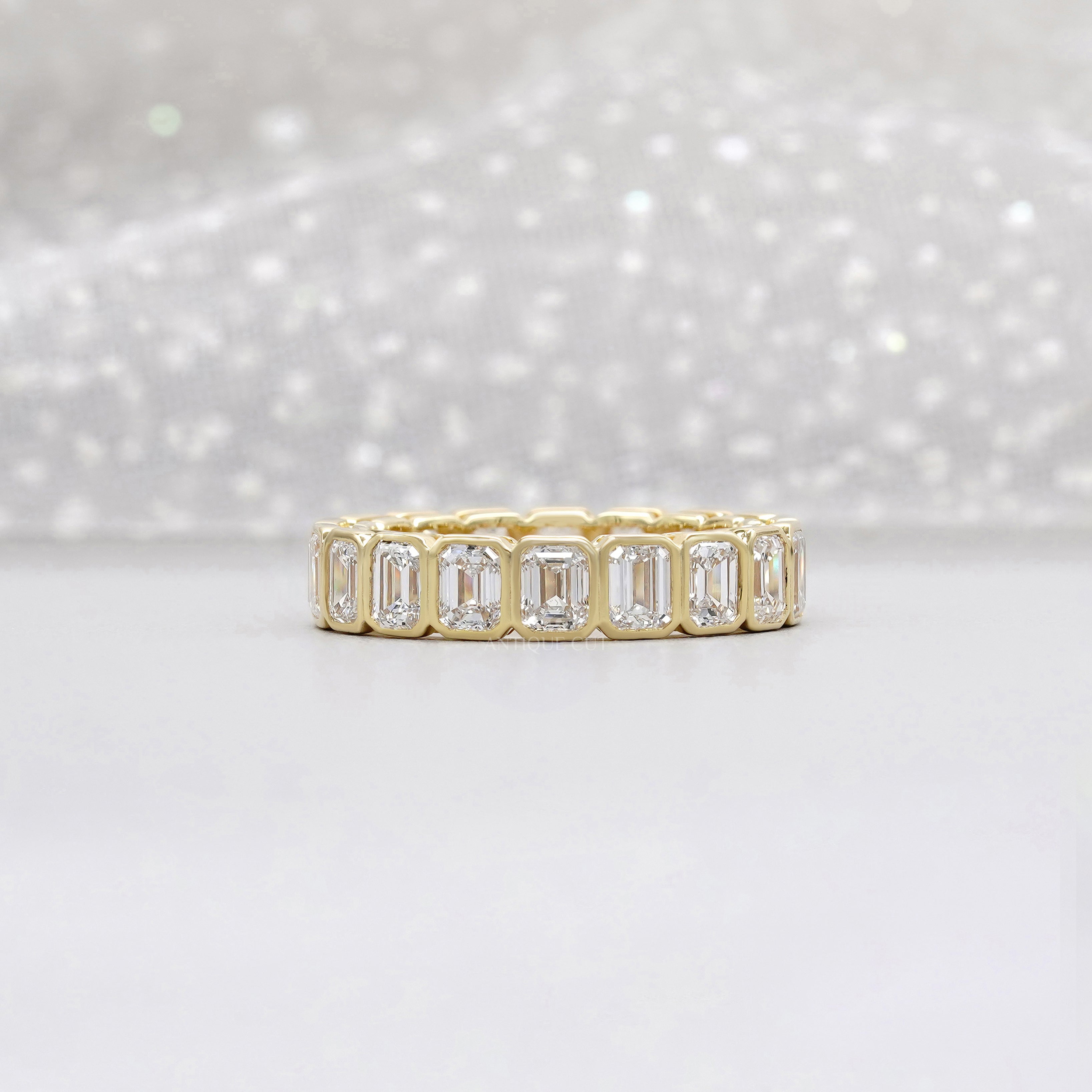 Emerald Cut 3.60tcw Lab Diamond Eternity Band | IGI Certified | Yellow Gold