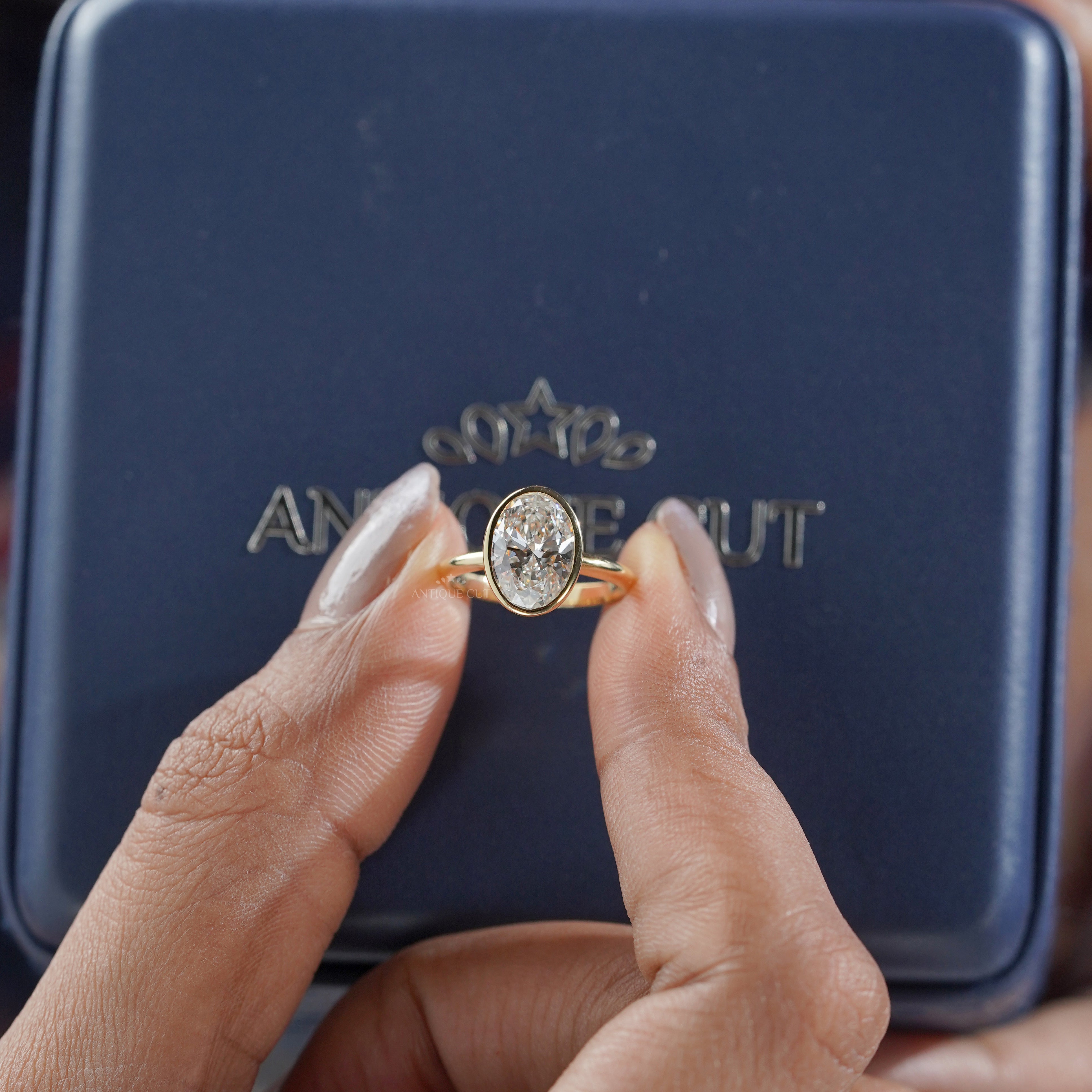 Oval 2.00ct Lab Grown Diamond Bezel Set Engagement Ring in Yellow Gold | IGI Certified