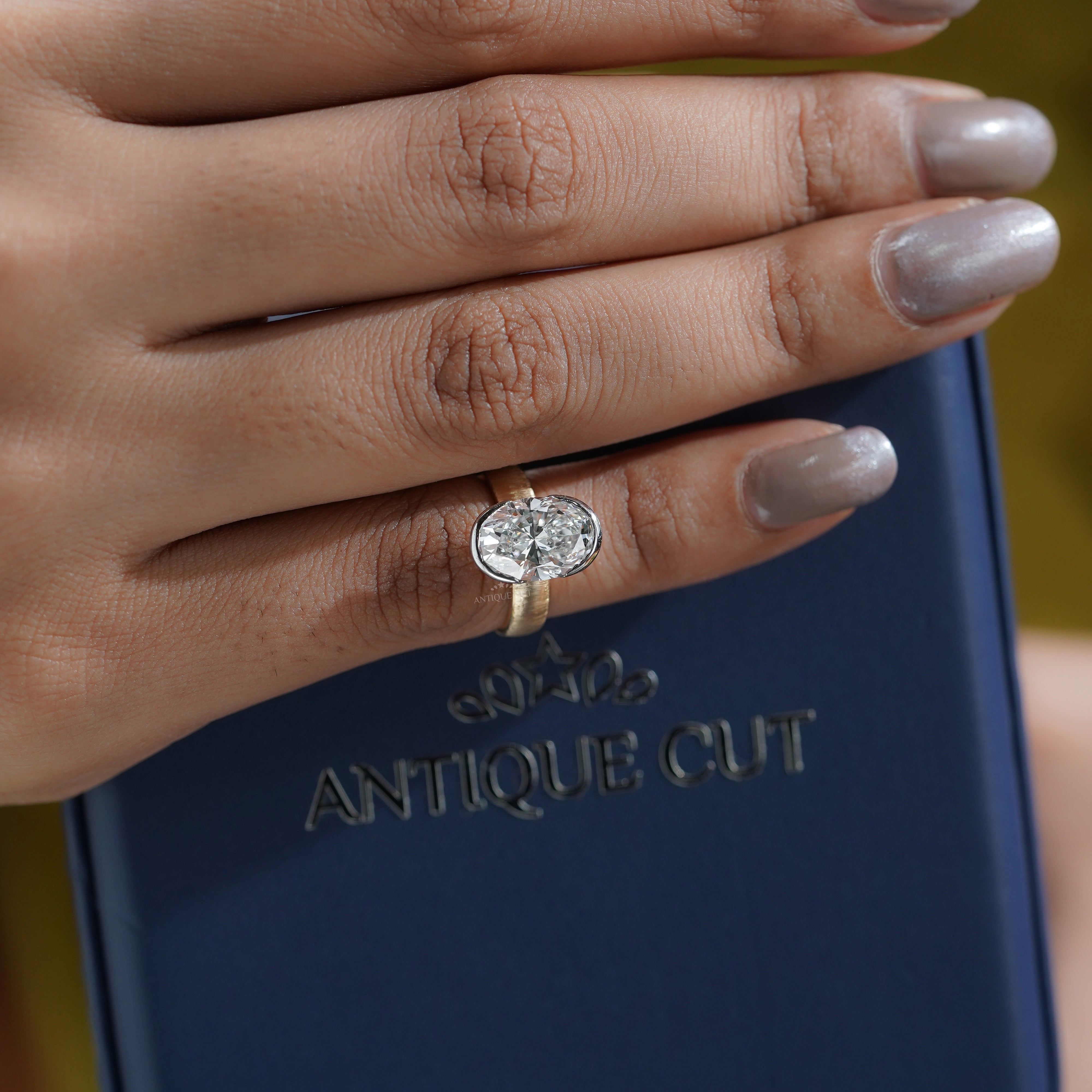 4ct Oval Lab Grown Diamond Bezel Engagement Ring | Two-Tone Matte Finish | IGI Certified D-E-F VVS–VS