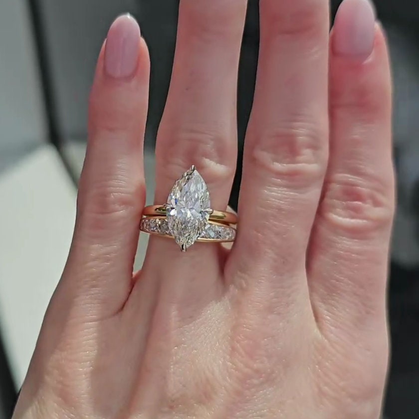 Marquise 3.30tcw Lab Grown Diamond Two Tone Hidden Halo Engagement Ring, D-E-F Color, VVS-VS Clarity
