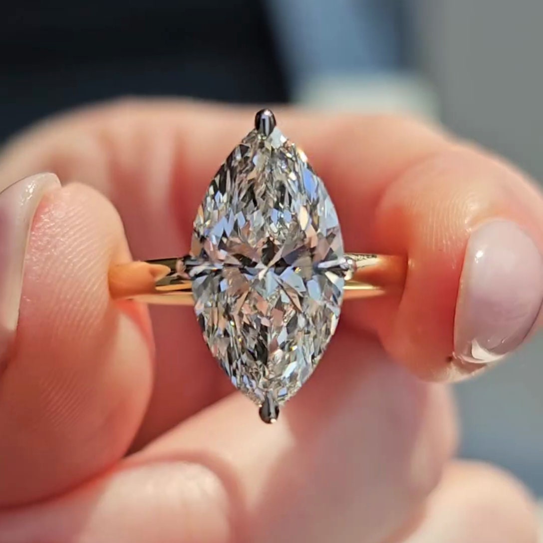 Marquise 3.30tcw Lab Grown Diamond Two Tone Hidden Halo Engagement Ring, D-E-F Color, VVS-VS Clarity