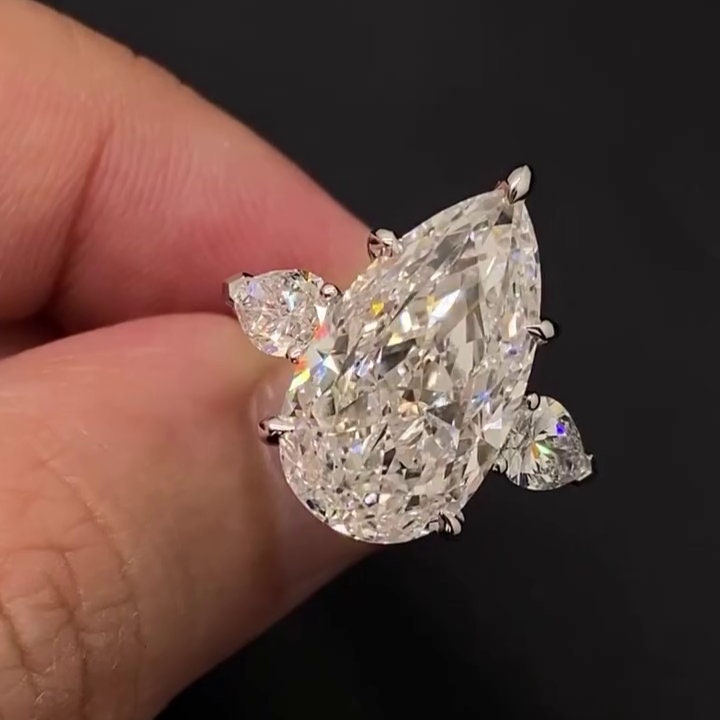 Pear 10.00tcw Lab Grown Diamond Cathedral Three Stone Engagement Ring, EF Color, VS Clarity
