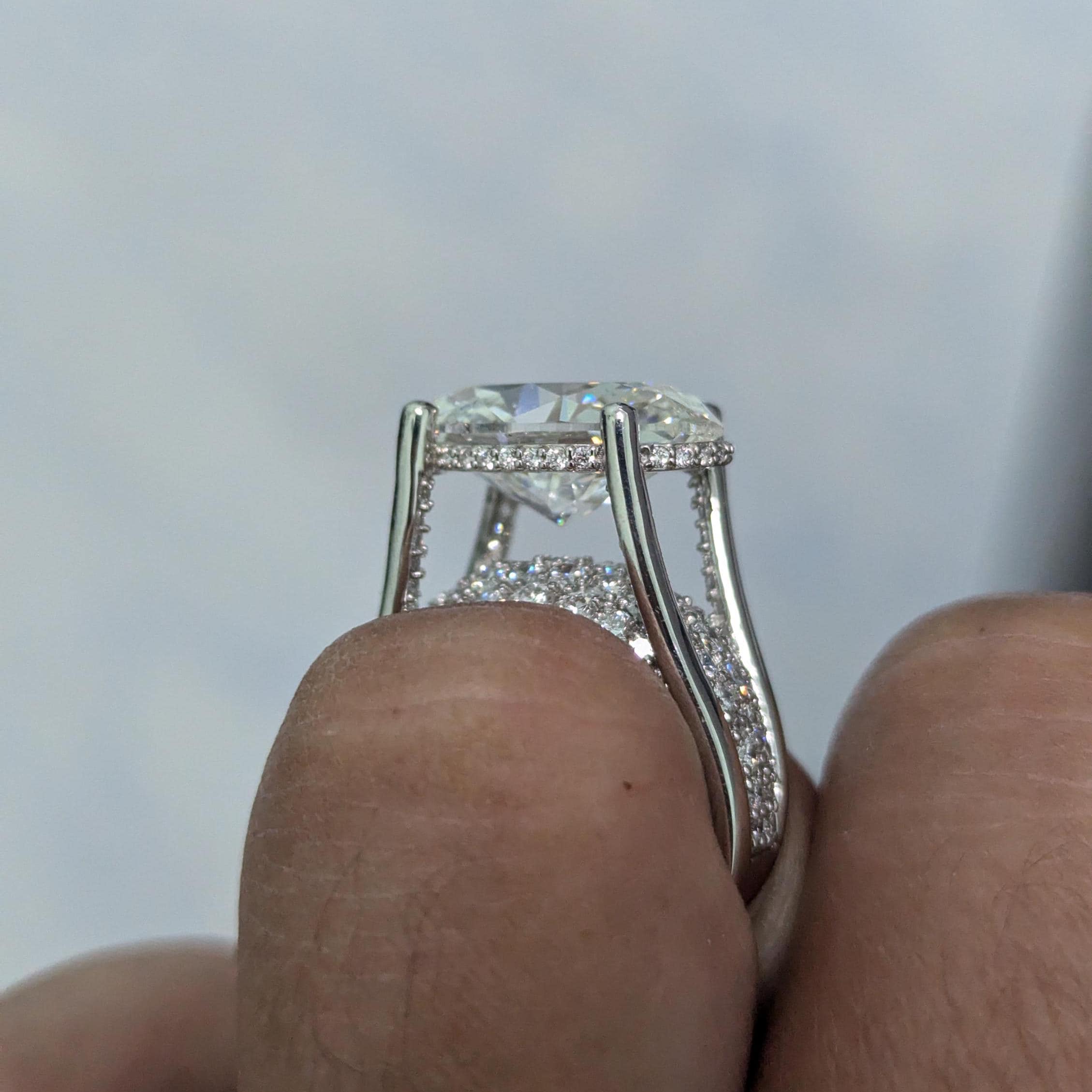 Oval 8.60tcw Lab Grown Diamond East-West Tension Hidden Halo Engagement Ring, EF Color, VS Clarity
