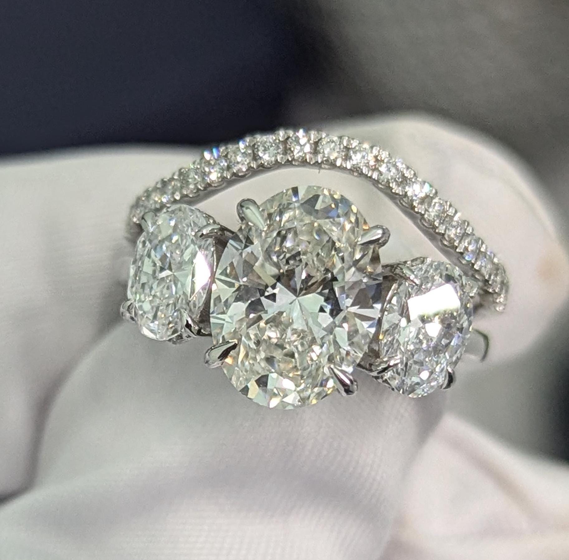 Oval 3.50tcw Lab Grown Diamond Hidden Halo Three Stone Engagement Ring With Band, D-E-F Color, VVS-VS Clarity