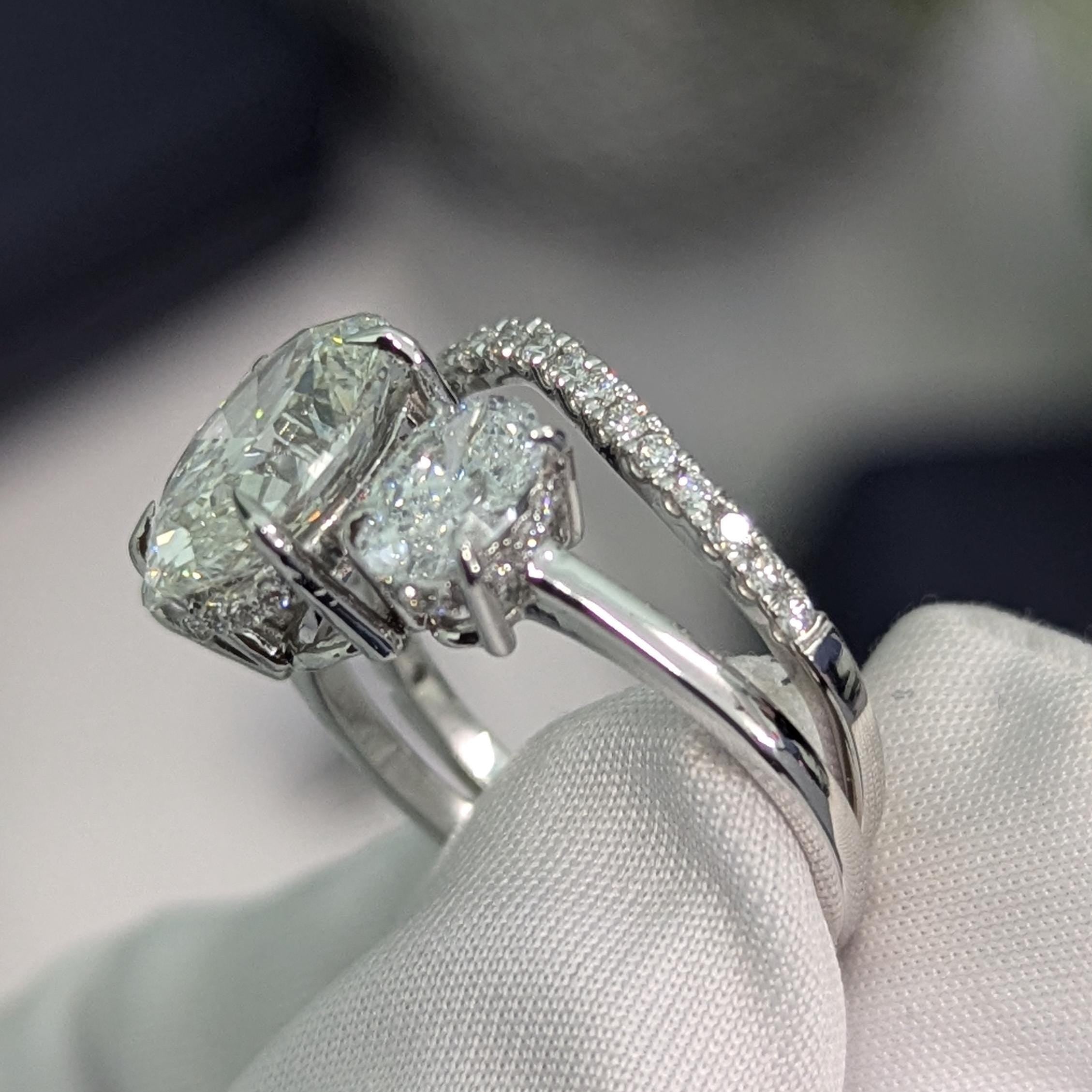 Oval 3.50tcw Lab Grown Diamond Hidden Halo Three Stone Engagement Ring With Band, D-E-F Color, VVS-VS Clarity