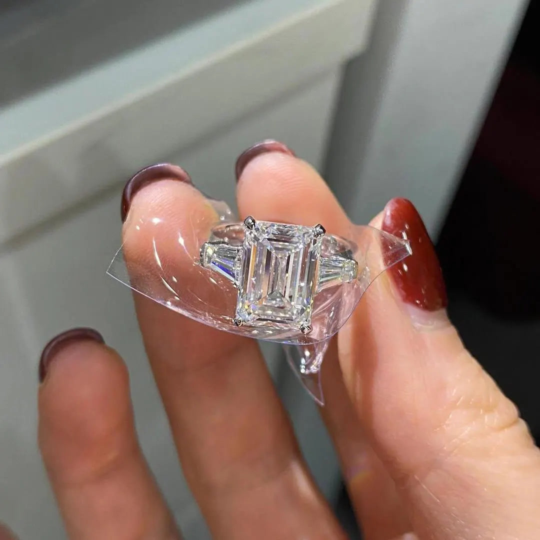 Emerald 5.50tcw Lab Grown Diamond Three Stone Cathedral Engagement Ring, D-E-F Color, VVS-VS Clarity