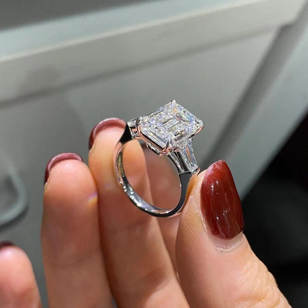 Emerald 5.50tcw Lab Grown Diamond Three Stone Cathedral Engagement Ring, D-E-F Color, VVS-VS Clarity