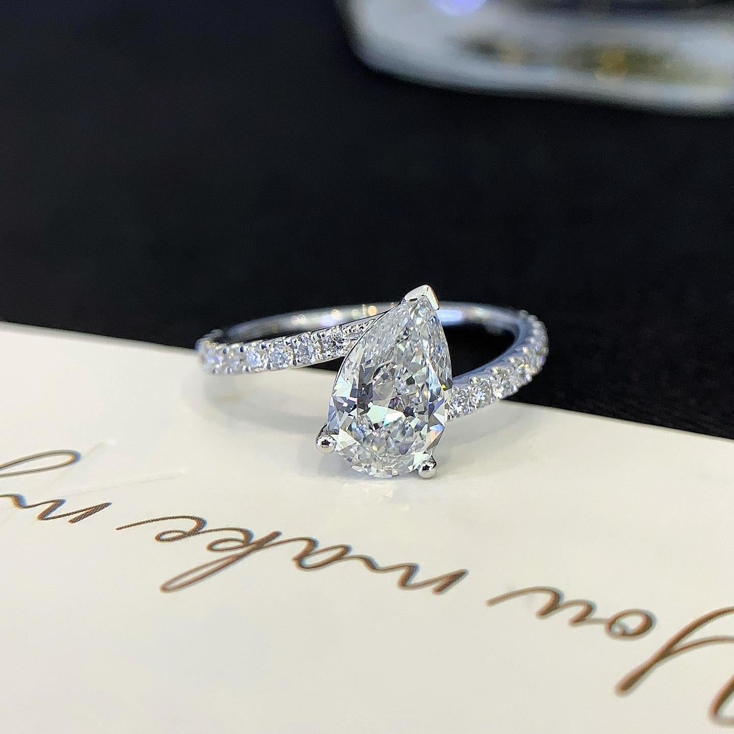 Pear 2.00tcw Lab Grown Diamond Solitaire Basket With Bypass Band Engagement Ring, D-E-F Color, VVS-VS Clarity - IGI Certified