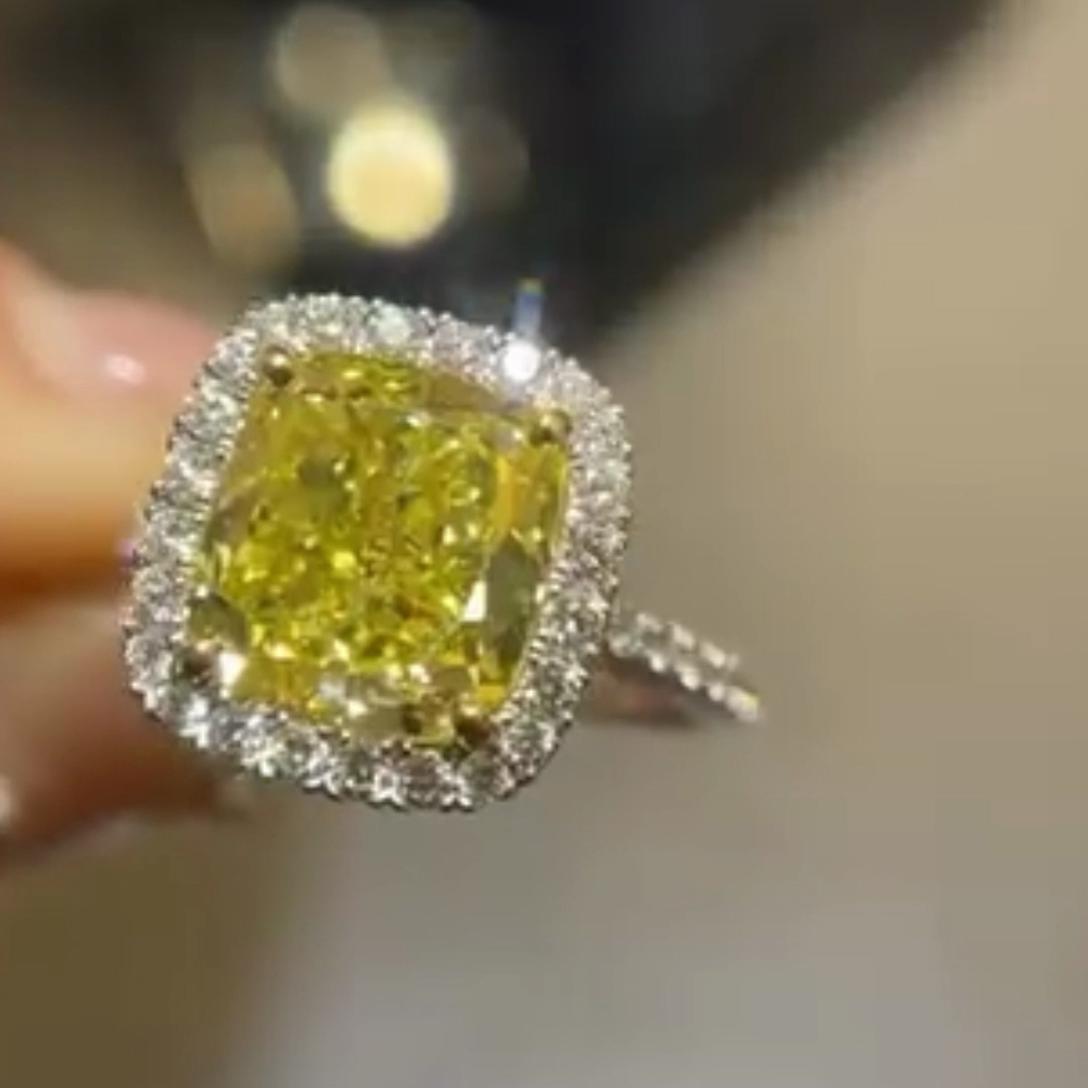 Fancy Yellow 5.00tcw Cushion Lab Diamond Halo Engagement Ring | 4ct Center | IGI Certified