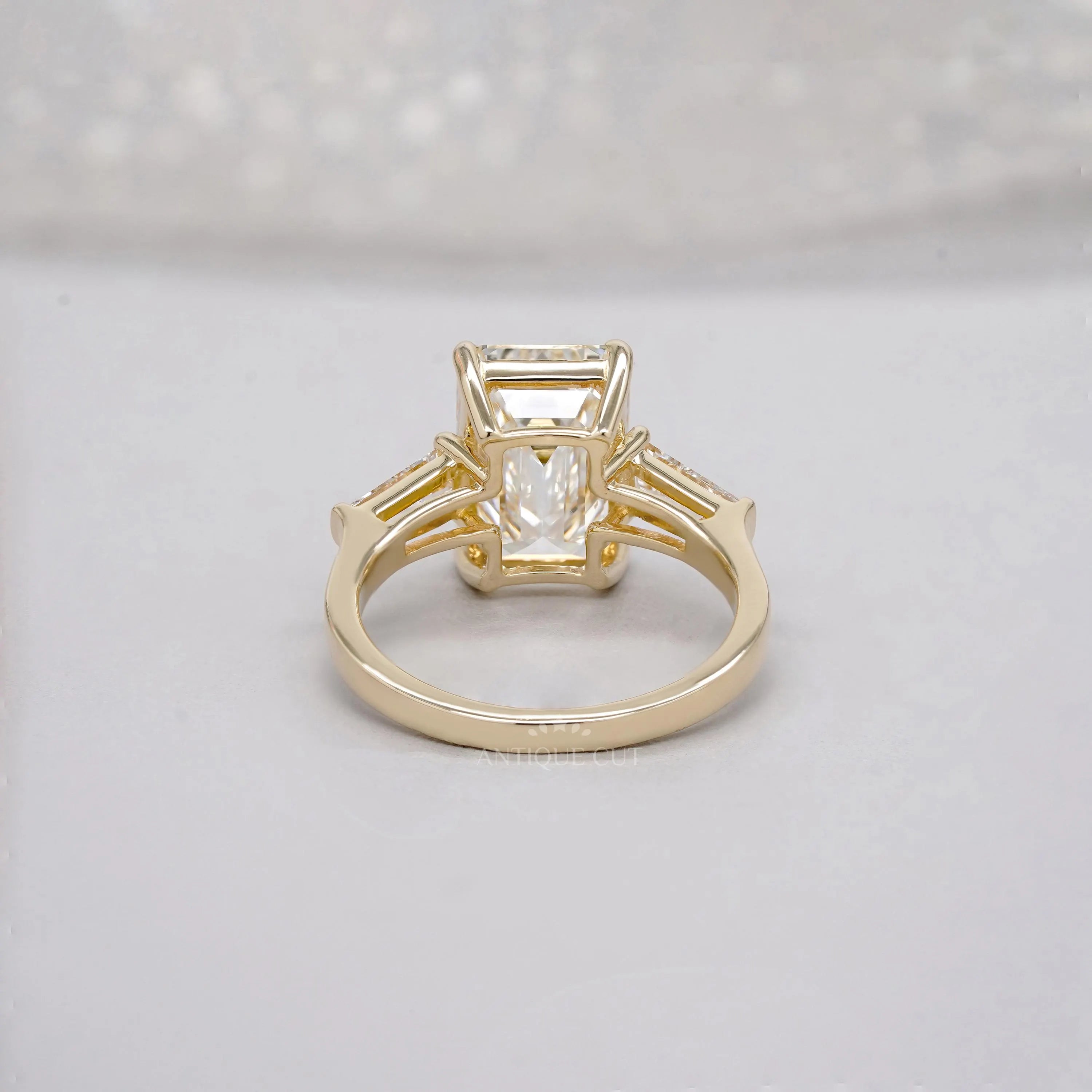 Emerald 5.60tcw Lab Diamond Three Stone Engagement Ring | Tap Baguette Side | IGI Certified