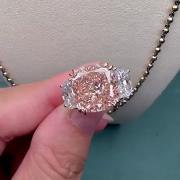 Fancy Pink 7.00tcw Lab Diamond 3-Stone Engagement Ring | 5ct Cushion Center + 2ct Side Stones | IGI Certified