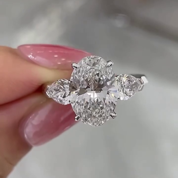 Oval 6.00tcw Lab Grown Diamond Three Stone Cathedral Engagement Ring | D-E-F Color | VVS–VS Clarity | IGI Certified | Luxe Bridal Ring