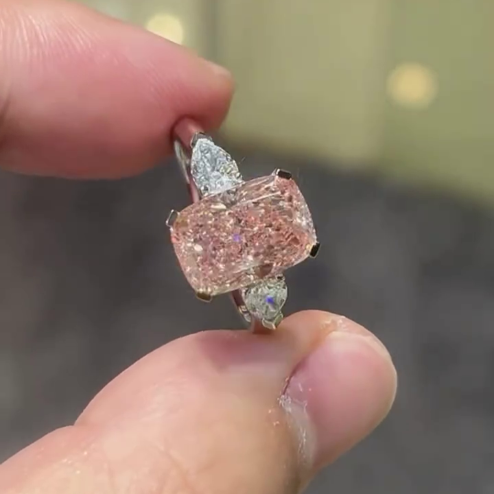 4.40tcw Fancy Pink Cushion Lab Grown Diamond Ring | 0.40ct Pear Side Stones | Three Stone Style Ring | White Gold | With IGI Certified