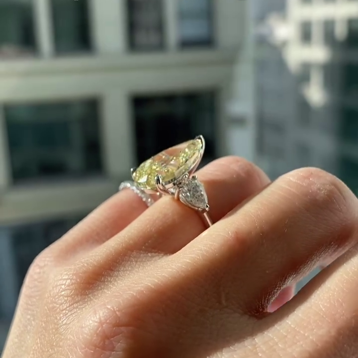 Pear Fancy Yellow 8.80tcw Lab Diamond Three Stone Ring | IGI VVS–VS
