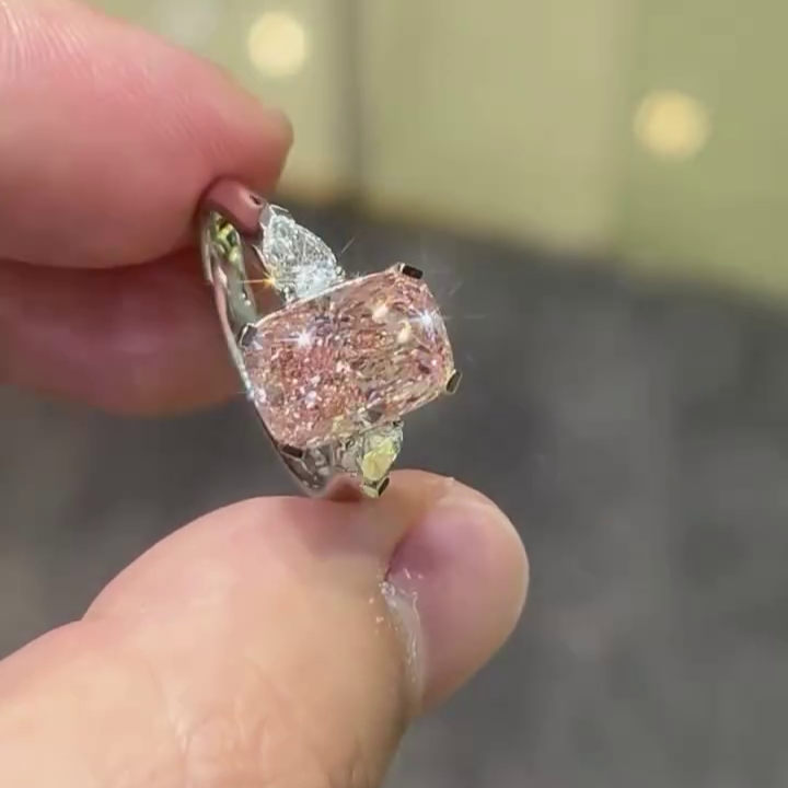 4.40tcw Fancy Pink Cushion Lab Grown Diamond Ring | 0.40ct Pear Side Stones | Three Stone Style Ring | White Gold | With IGI Certified
