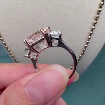 Fancy Pink 7.00tcw Lab Diamond 3-Stone Engagement Ring | 5ct Cushion Center + 2ct Side Stones | IGI Certified