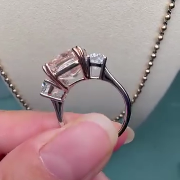 Fancy Pink 7.00tcw Lab Diamond 3-Stone Engagement Ring | 5ct Cushion Center + 2ct Side Stones | IGI Certified