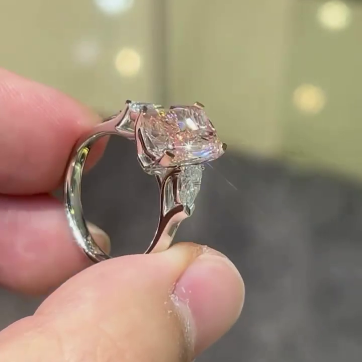 4.40tcw Fancy Pink Cushion Lab Grown Diamond Ring | 0.40ct Pear Side Stones | Three Stone Style Ring | White Gold | With IGI Certified