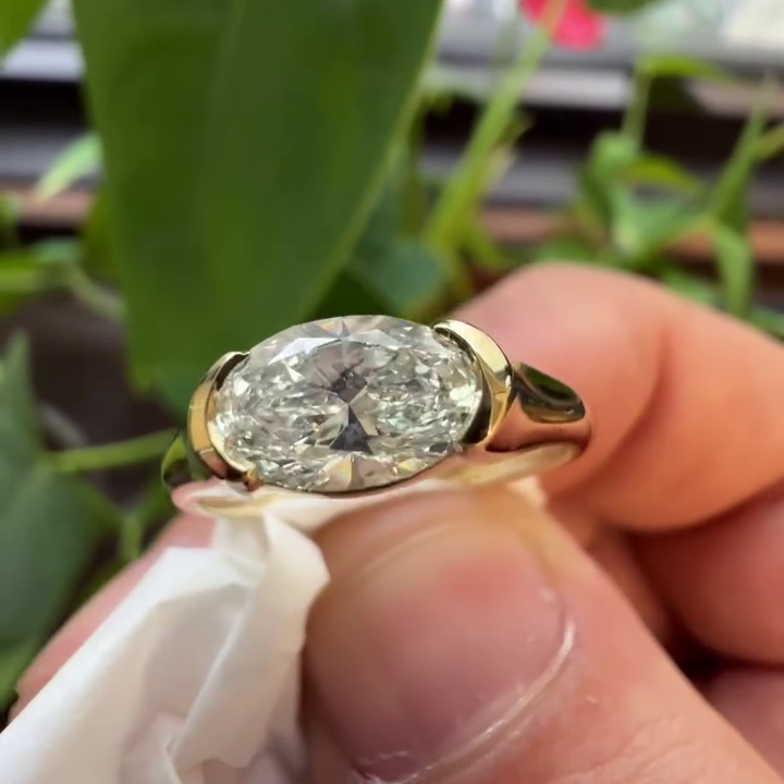 Custom 5ct Oval Lab-Grown Diamond Half-Bezel Engagement Ring | D VVS | 18K Yellow Gold | IGI Certified