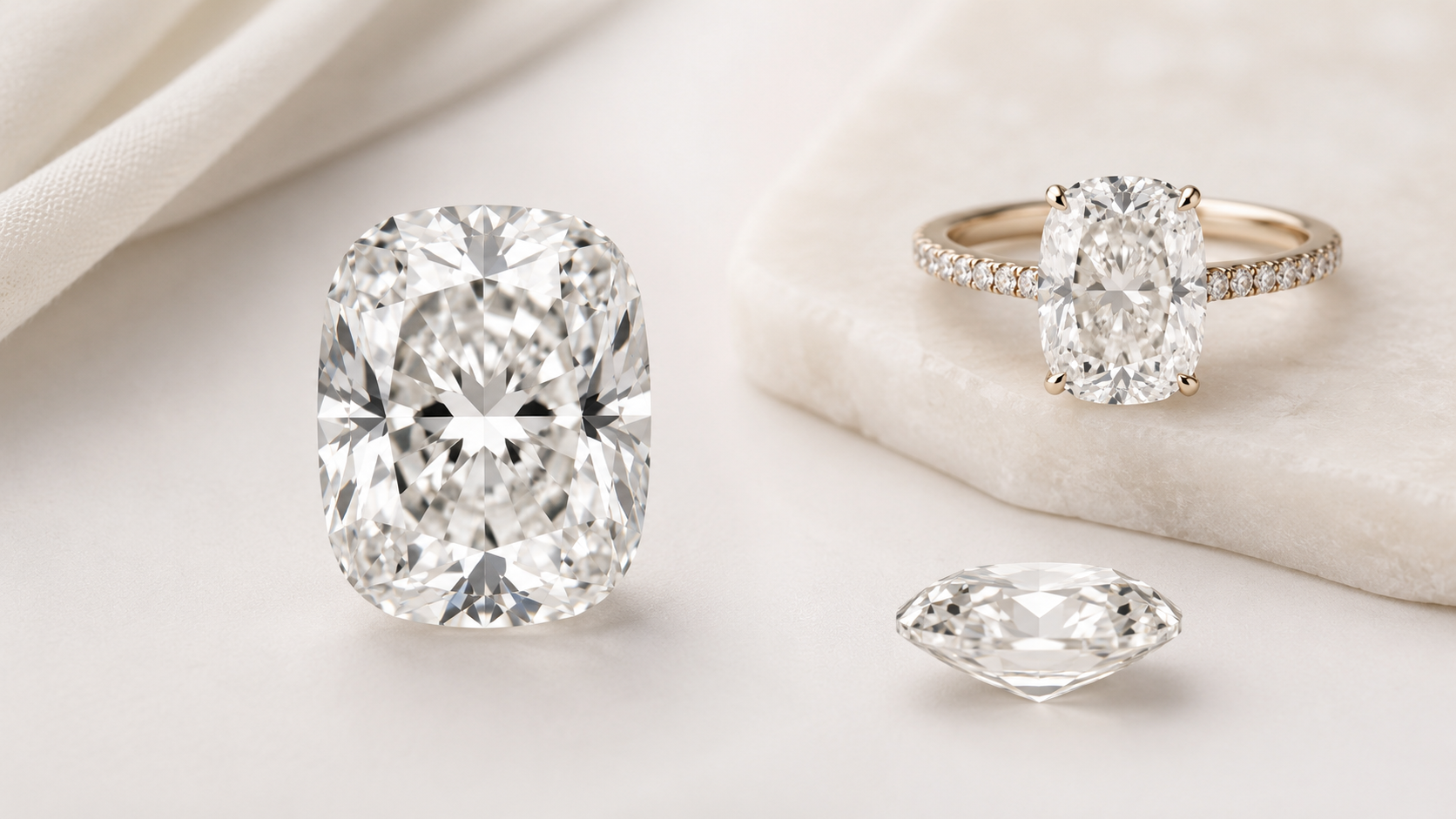 Elongated cushion cut diamond ring and loose diamond views on a soft ivory background.