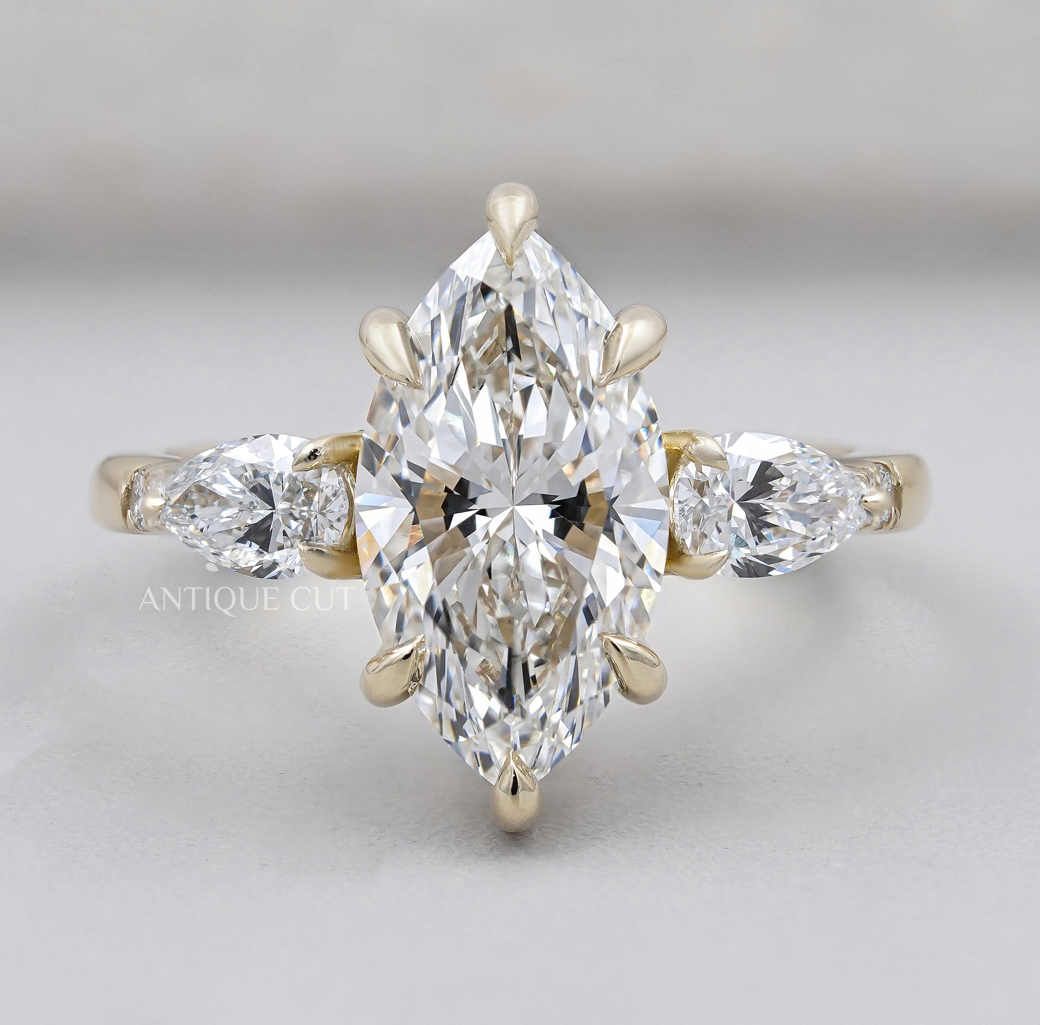 Marquise Cut Engagement Ring with Side Stones