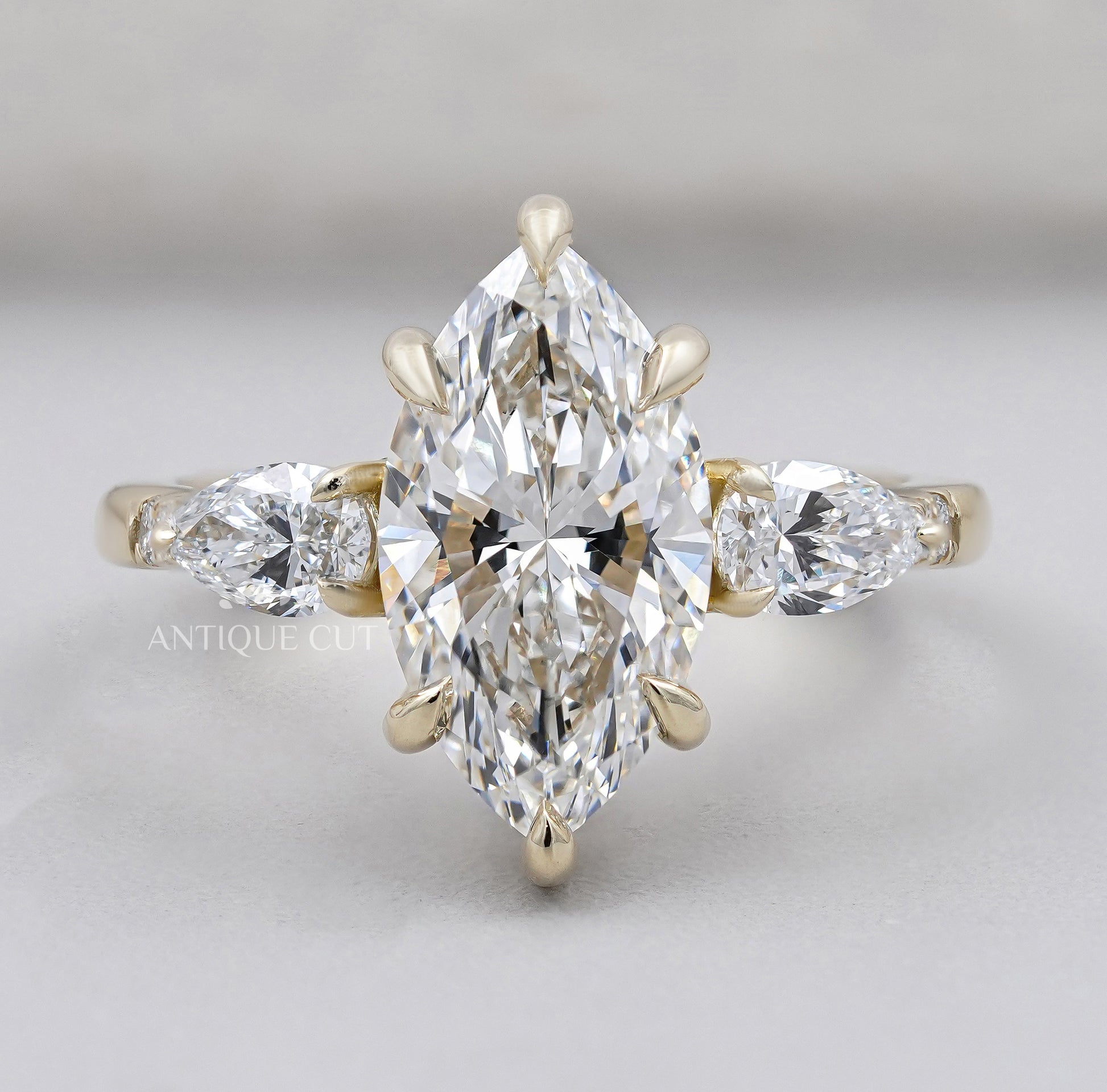 Marquise Cut Engagement Ring with Side Stones