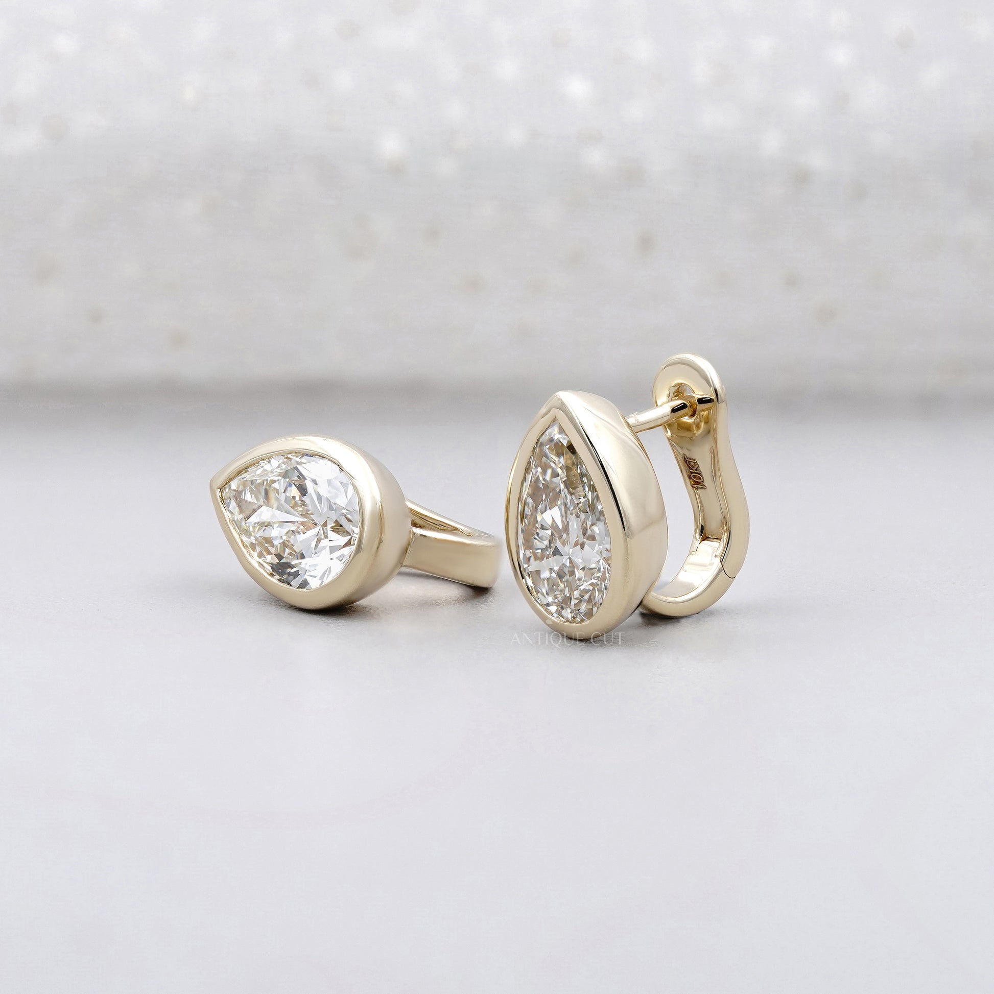 Pear Cut 4.00tcw Lab Grown Diamond Hoop Earrings | Bezel Set | IGI Certified