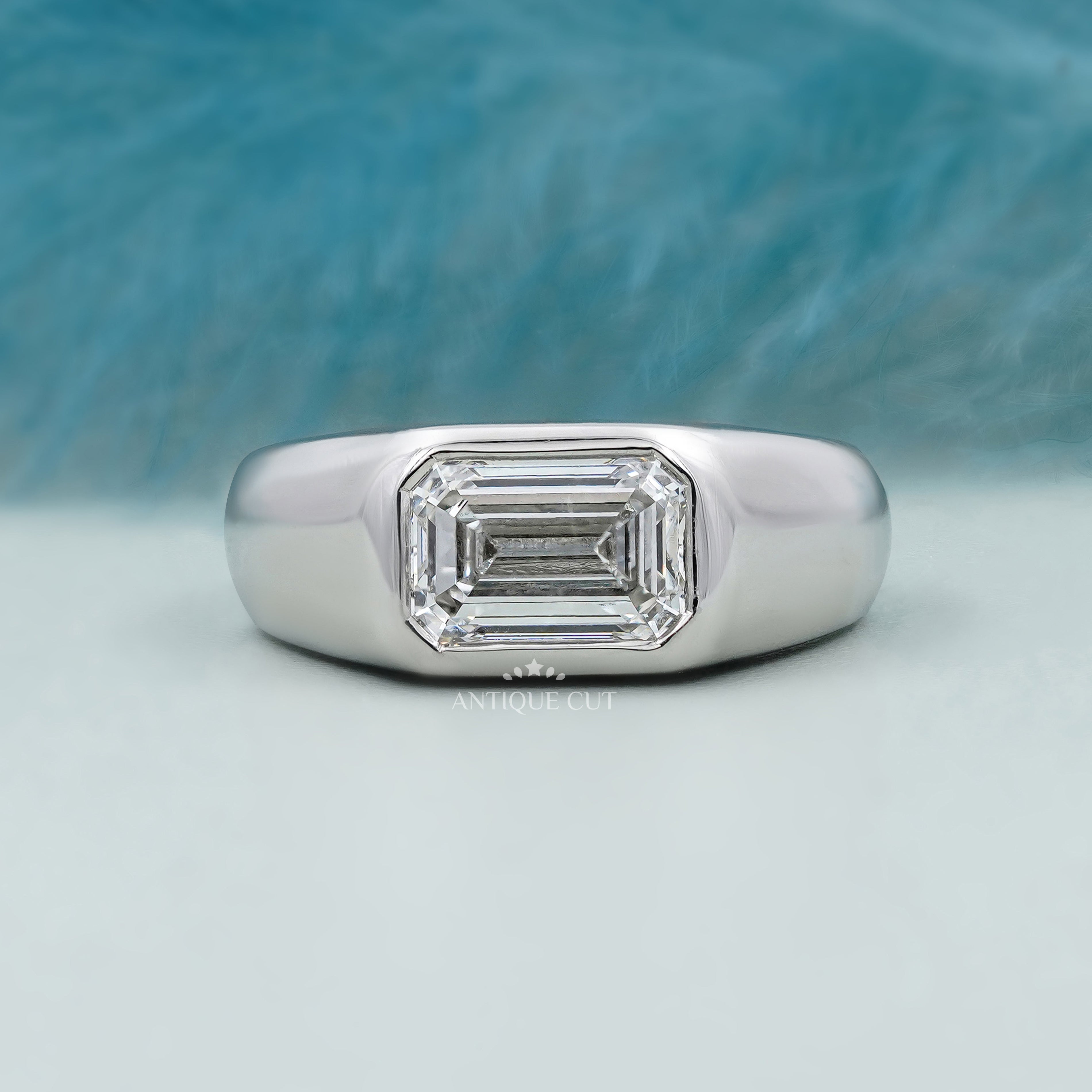 Emerald cut east west engagement ring design