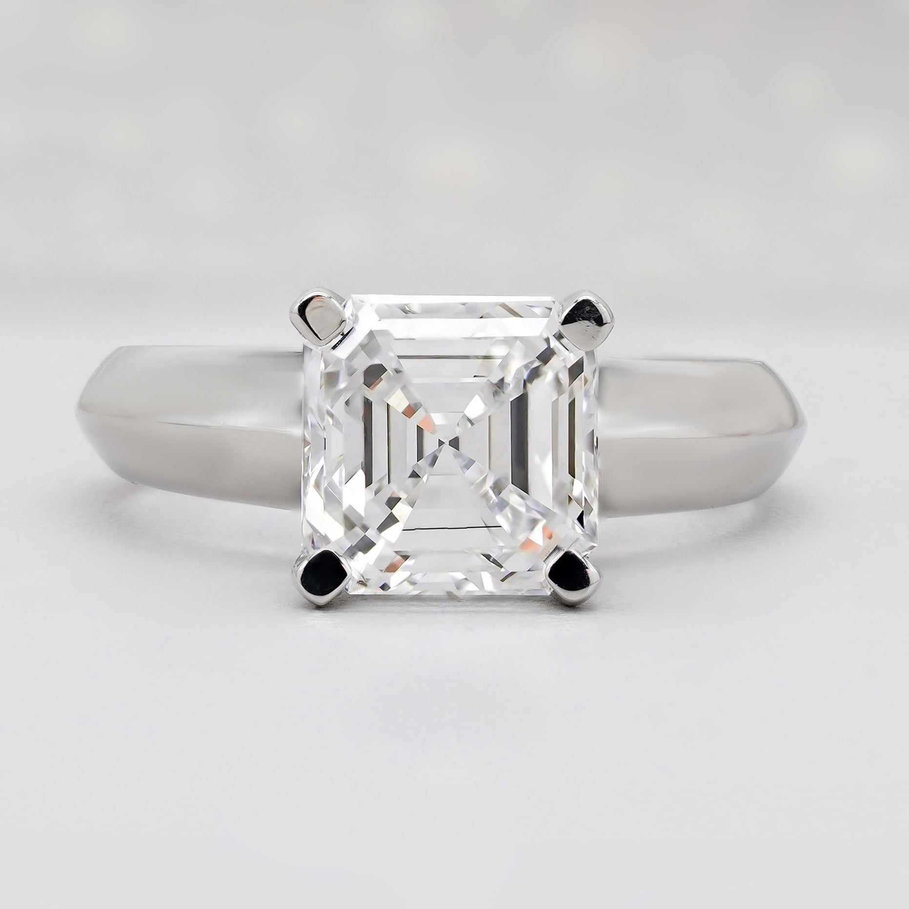 Asscher cut engagement ring in white gold
