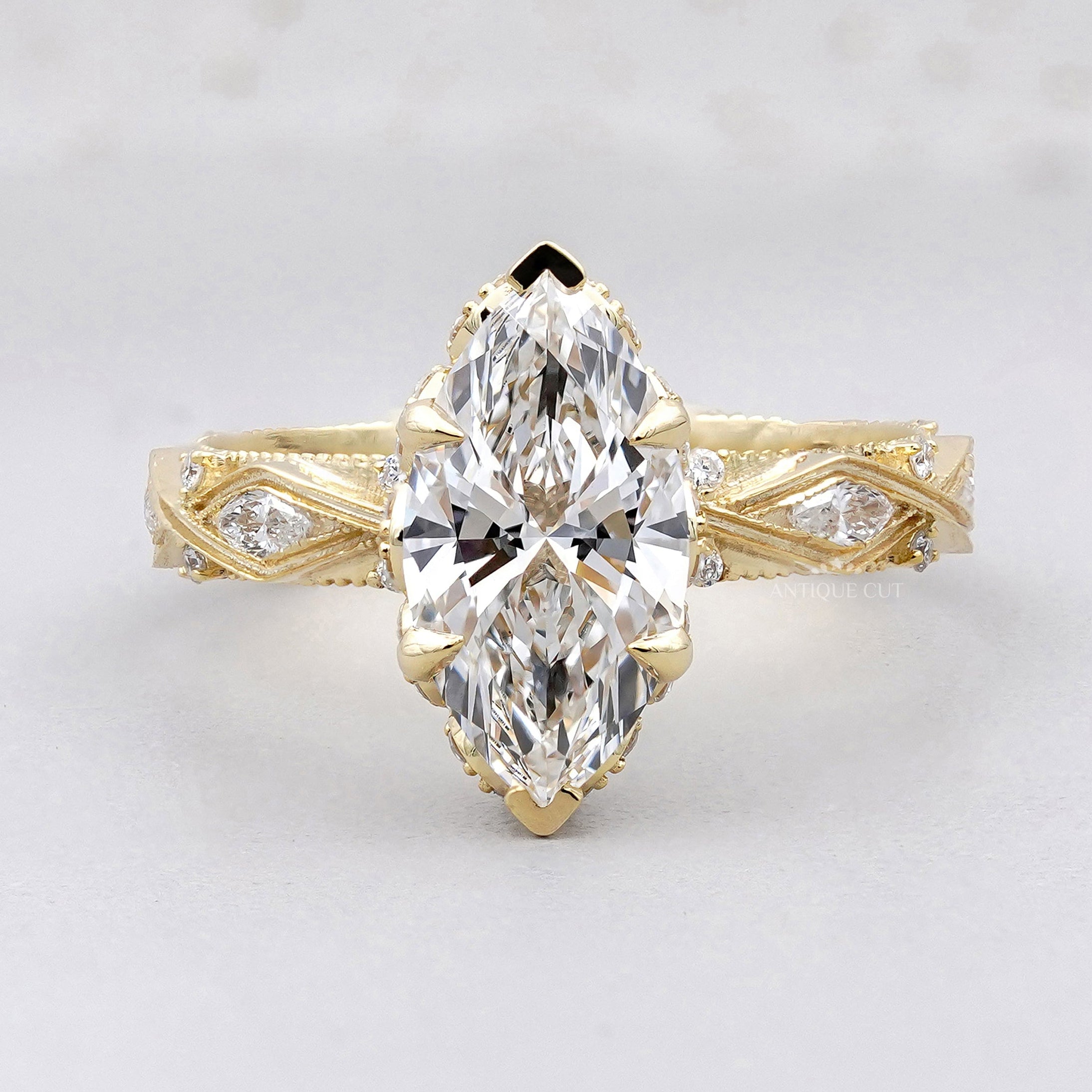 Vintage marquise engagement ring in yellow gold