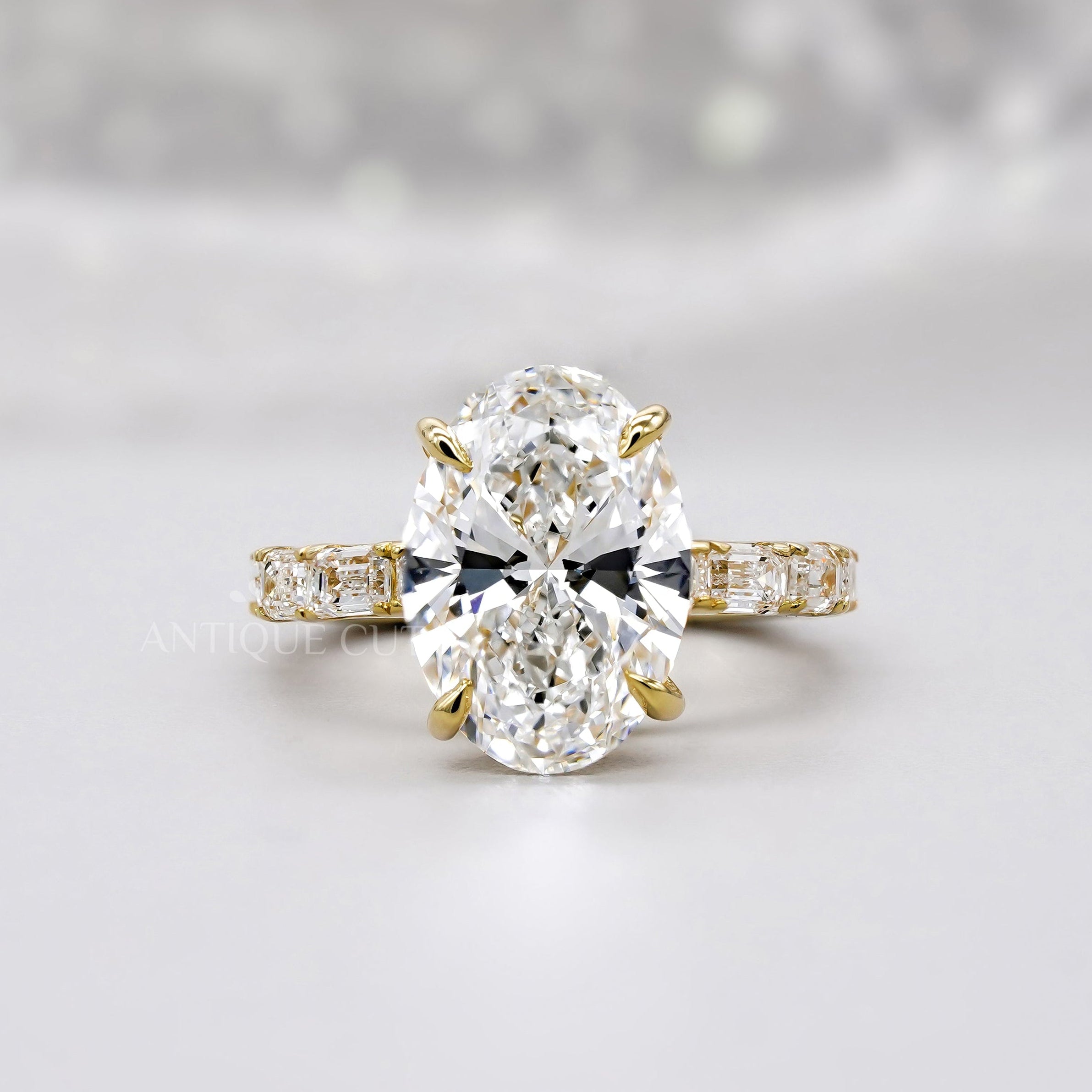 Oval 4.30tcw Lab Diamond Ring | Emerald & Round Side Stones | Yellow Gold | IGI Certified