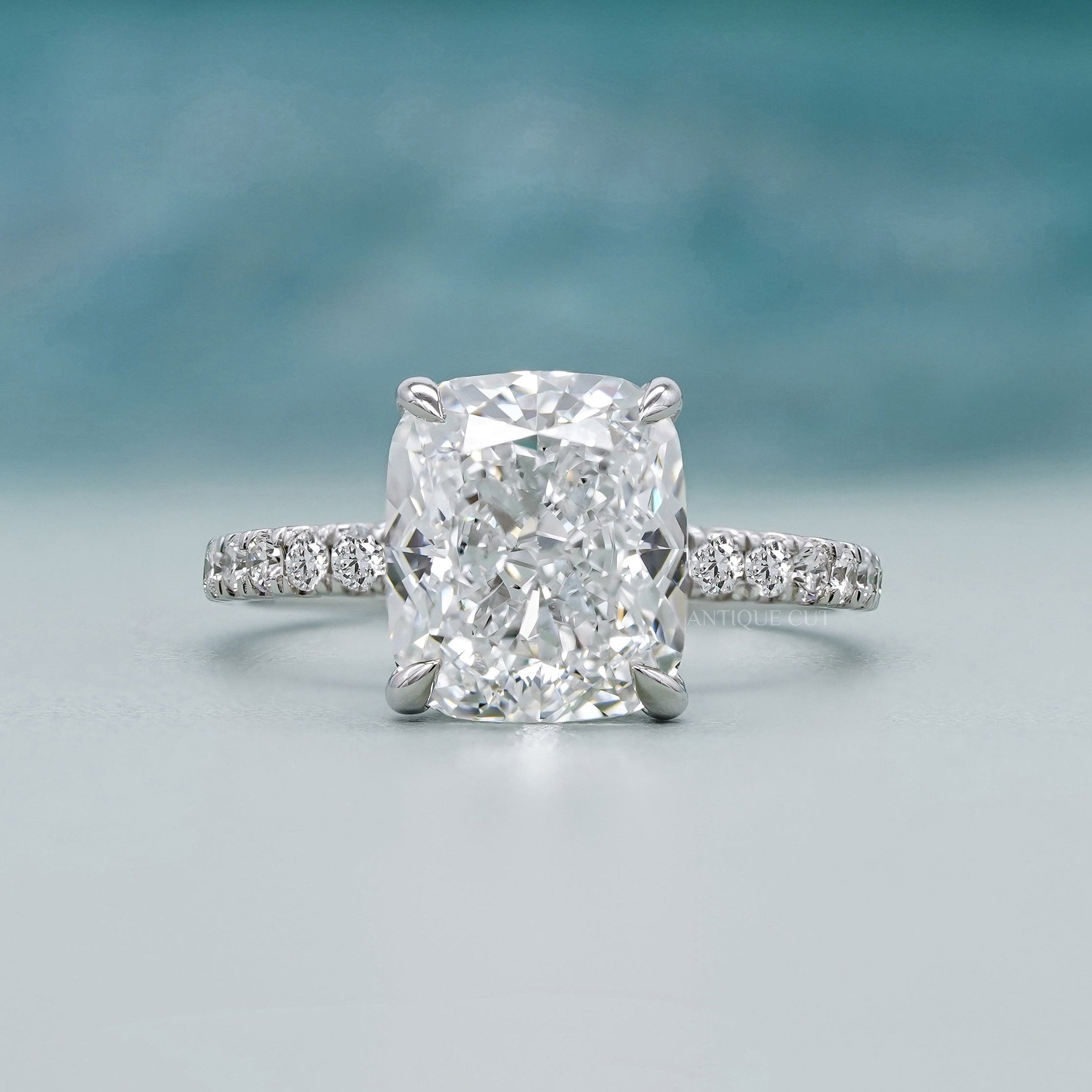 Hidden halo cushion cut engagement ring white gold