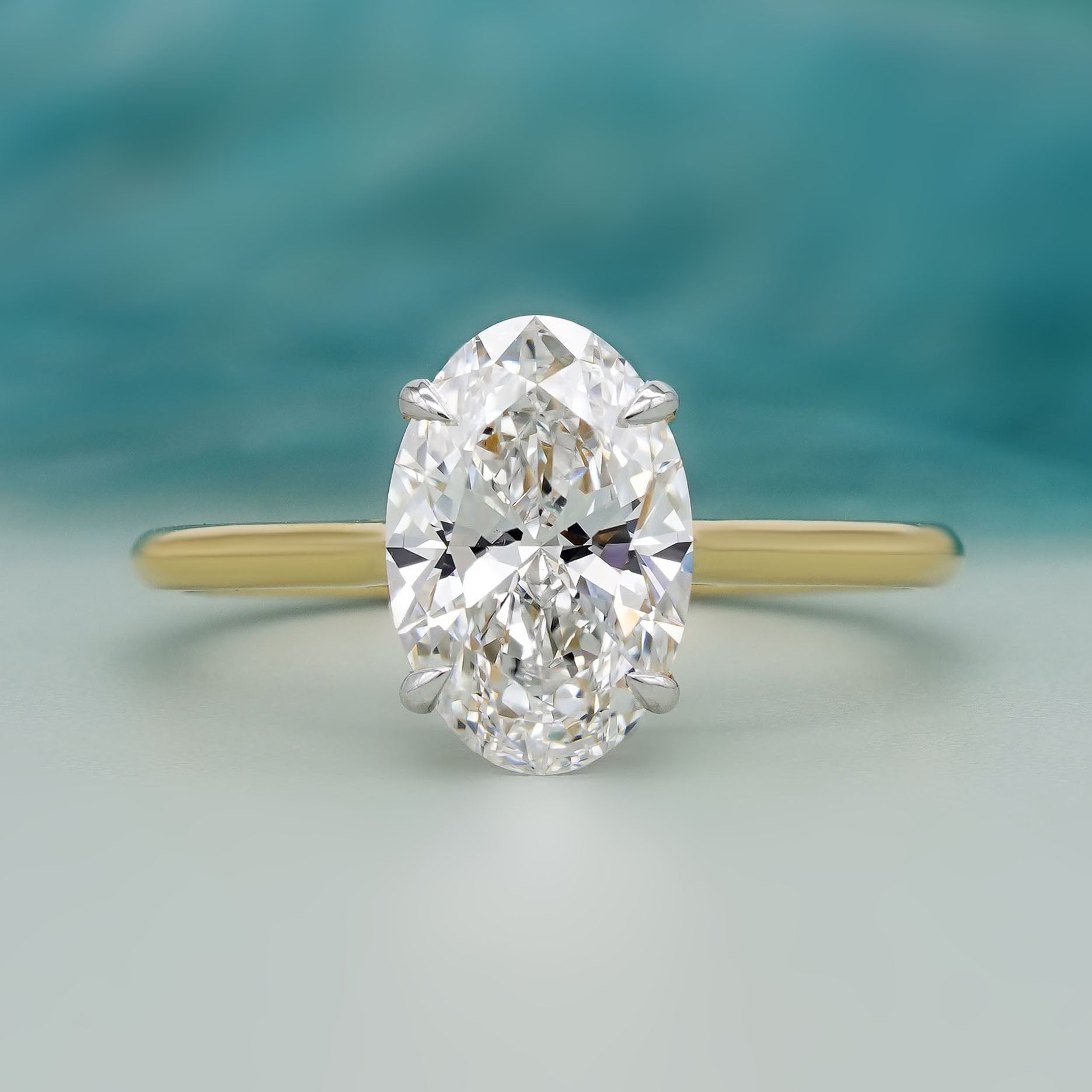 Oval solitaire lab grown diamond engagement ring