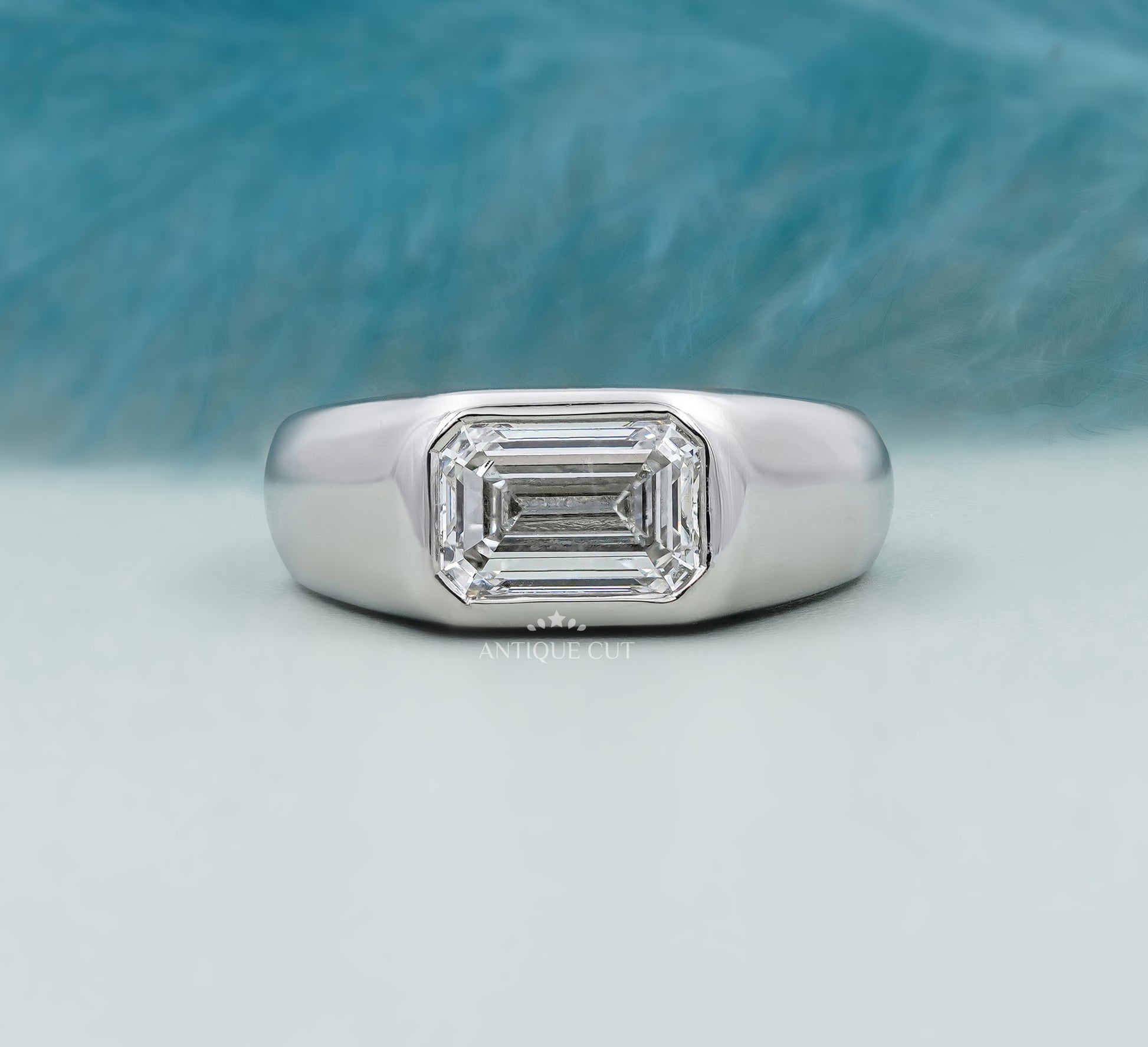 Emerald Cut East West Engagement Ring