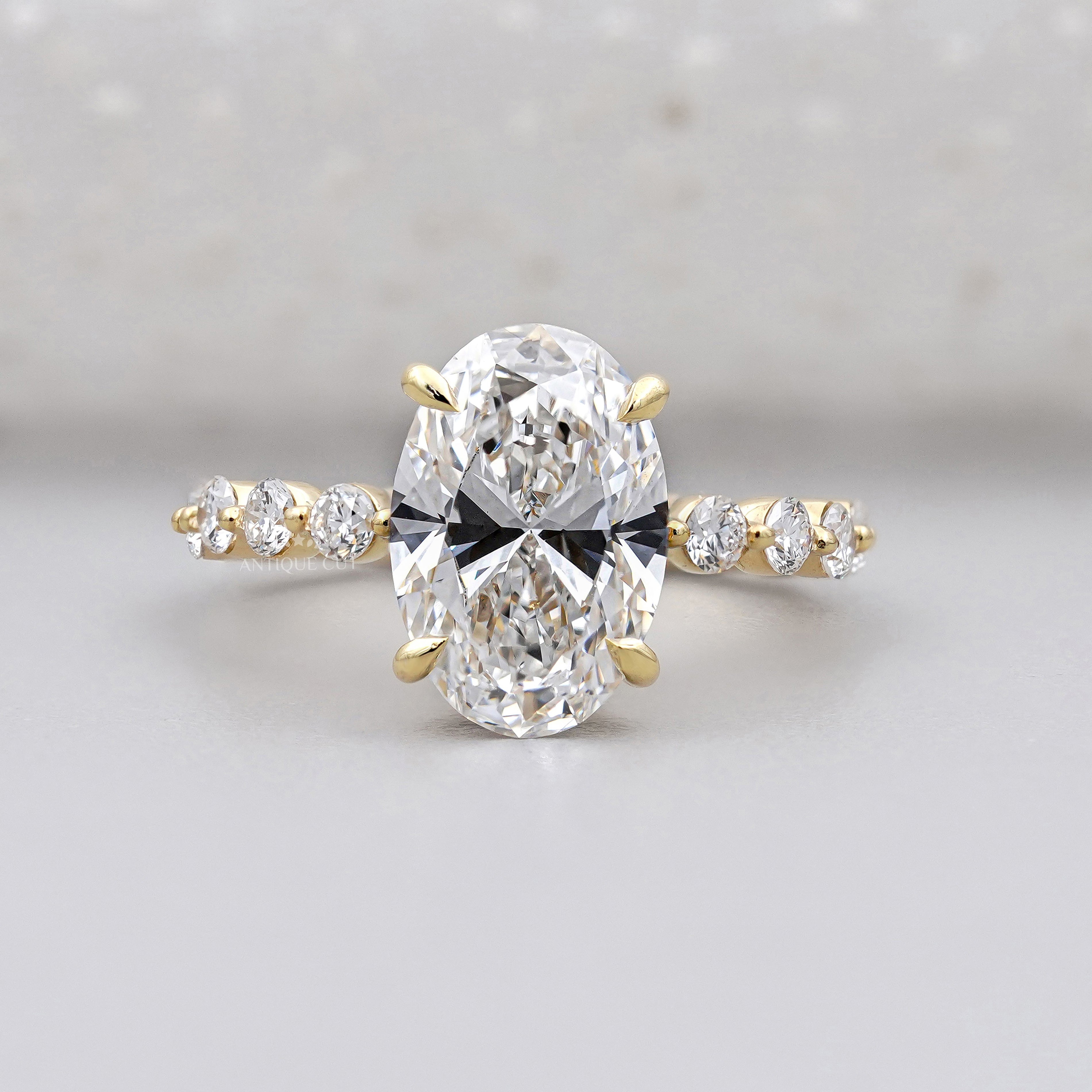 Hidden halo oval engagement ring with IGI-certified lab grown diamond