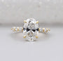 Hidden halo oval engagement ring with IGI-certified lab grown diamond