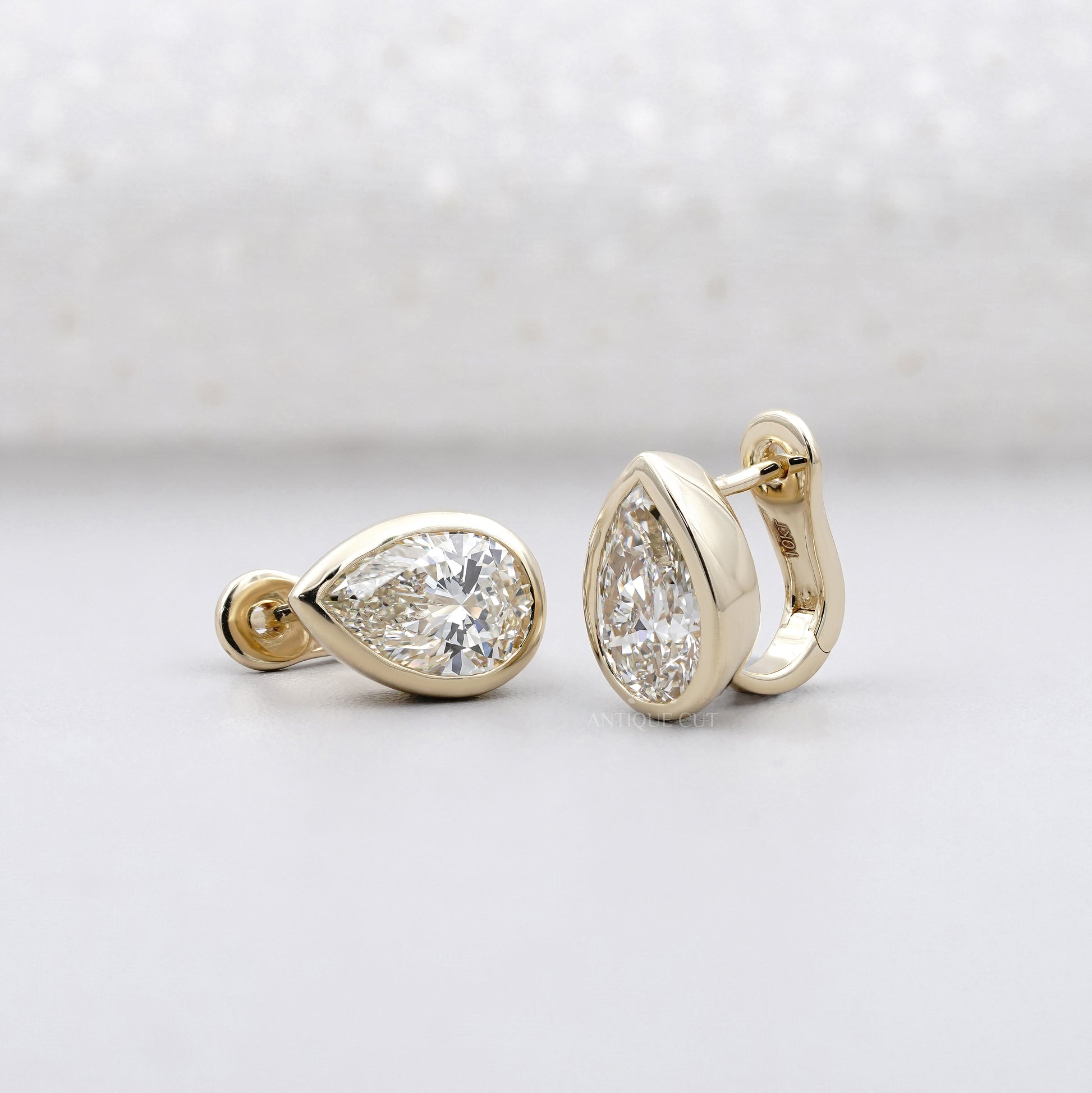 Pear Cut 4.00tcw Lab Grown Diamond Hoop Earrings | Bezel Set | IGI Certified