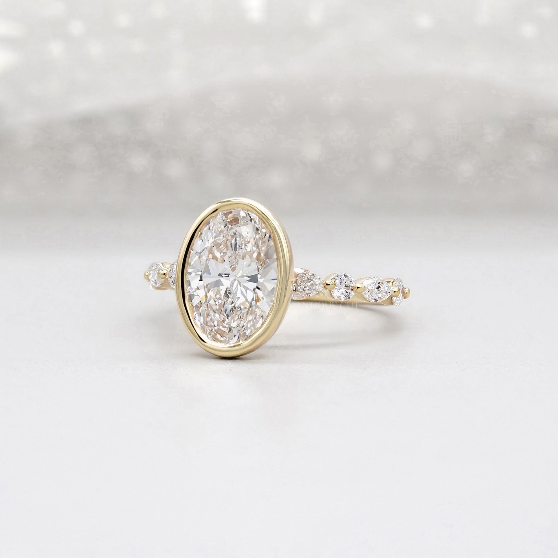 Oval 3.50tcw Bezel Set Lab Grown Diamond Engagement Ring | Yellow Gold with Side Stones | IGI Certified