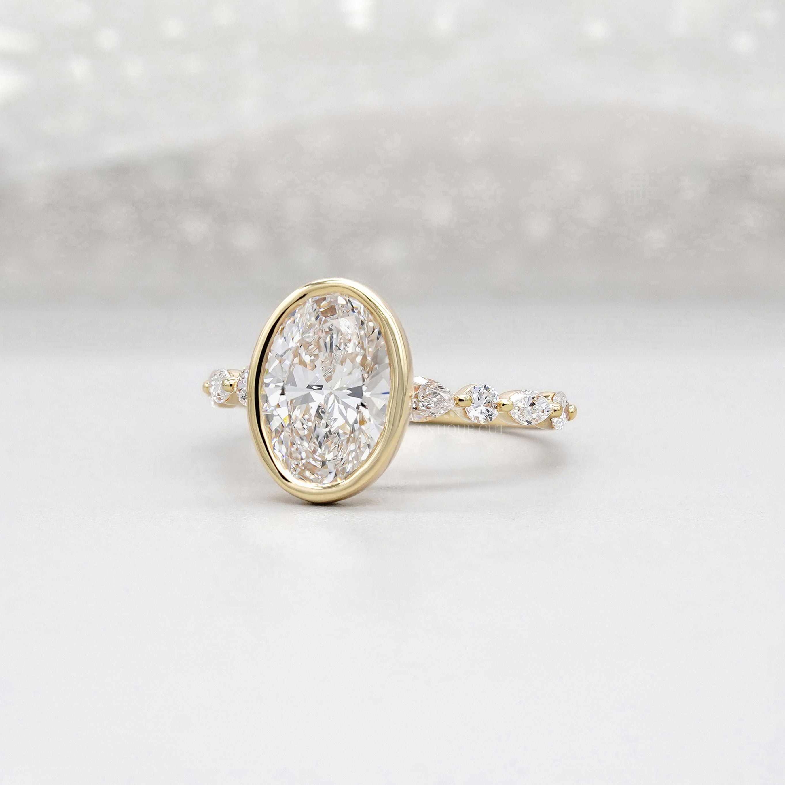 Oval 3.50tcw Bezel Set Lab Grown Diamond Engagement Ring | Yellow Gold with Side Stones | IGI Certified