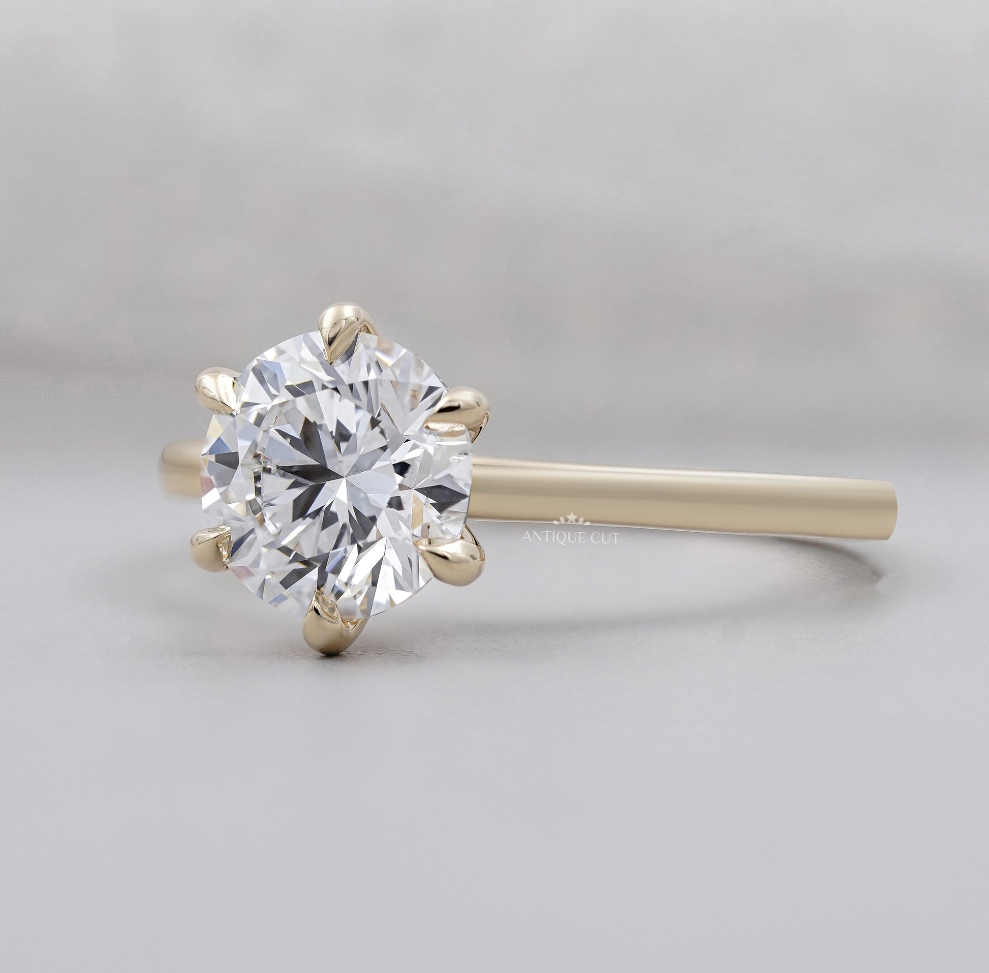 Round Brilliant Cut Diamond Solitaire Ring in Yellow Gold