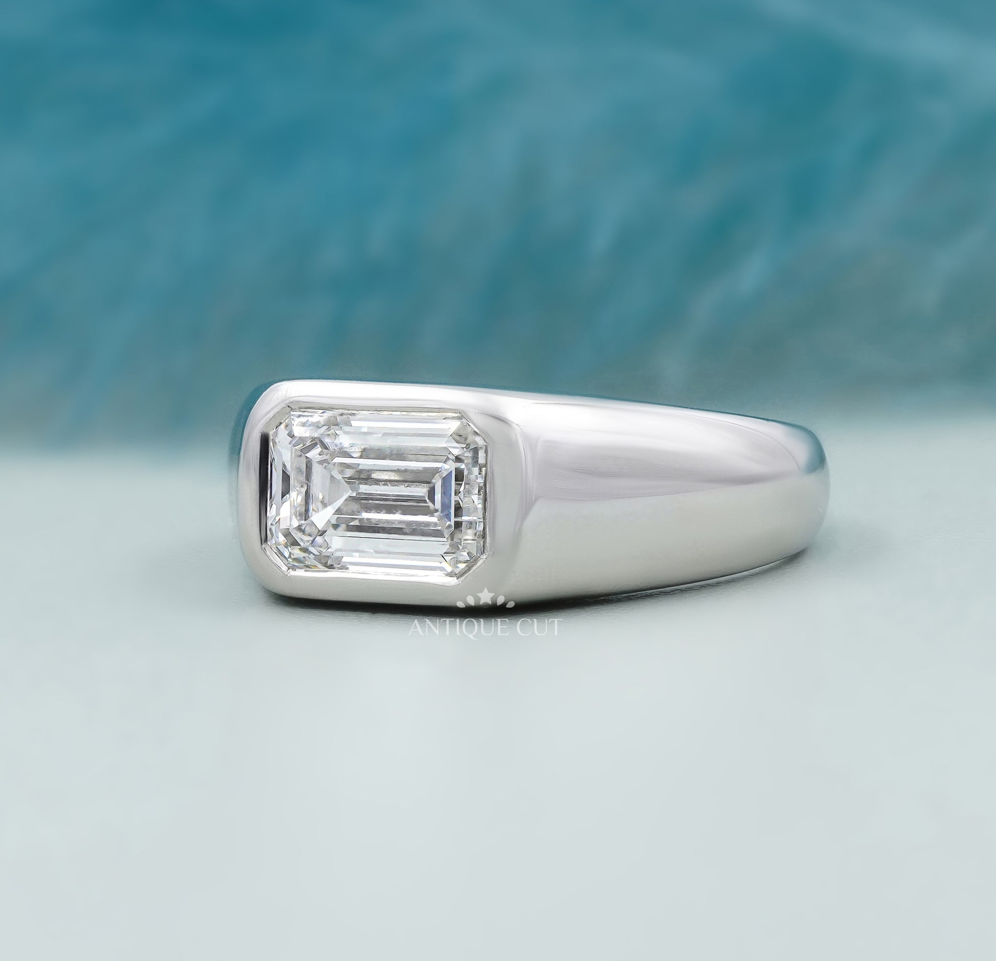 Emerald Cut East West Engagement Ring