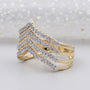 Gold and diamond ring on a light gray background

