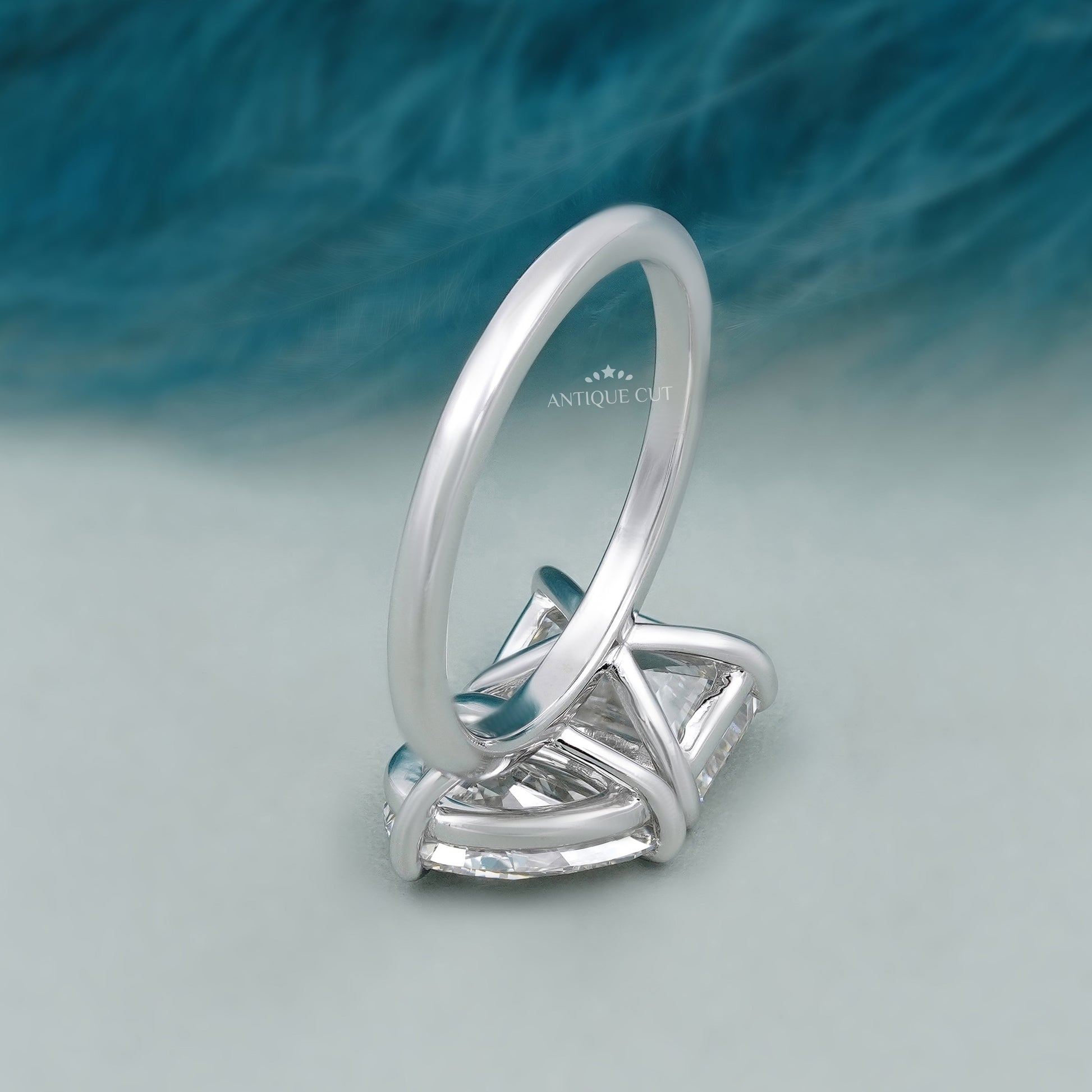 Toi et Moi Engagement Ring with Emerald and Pear Diamond