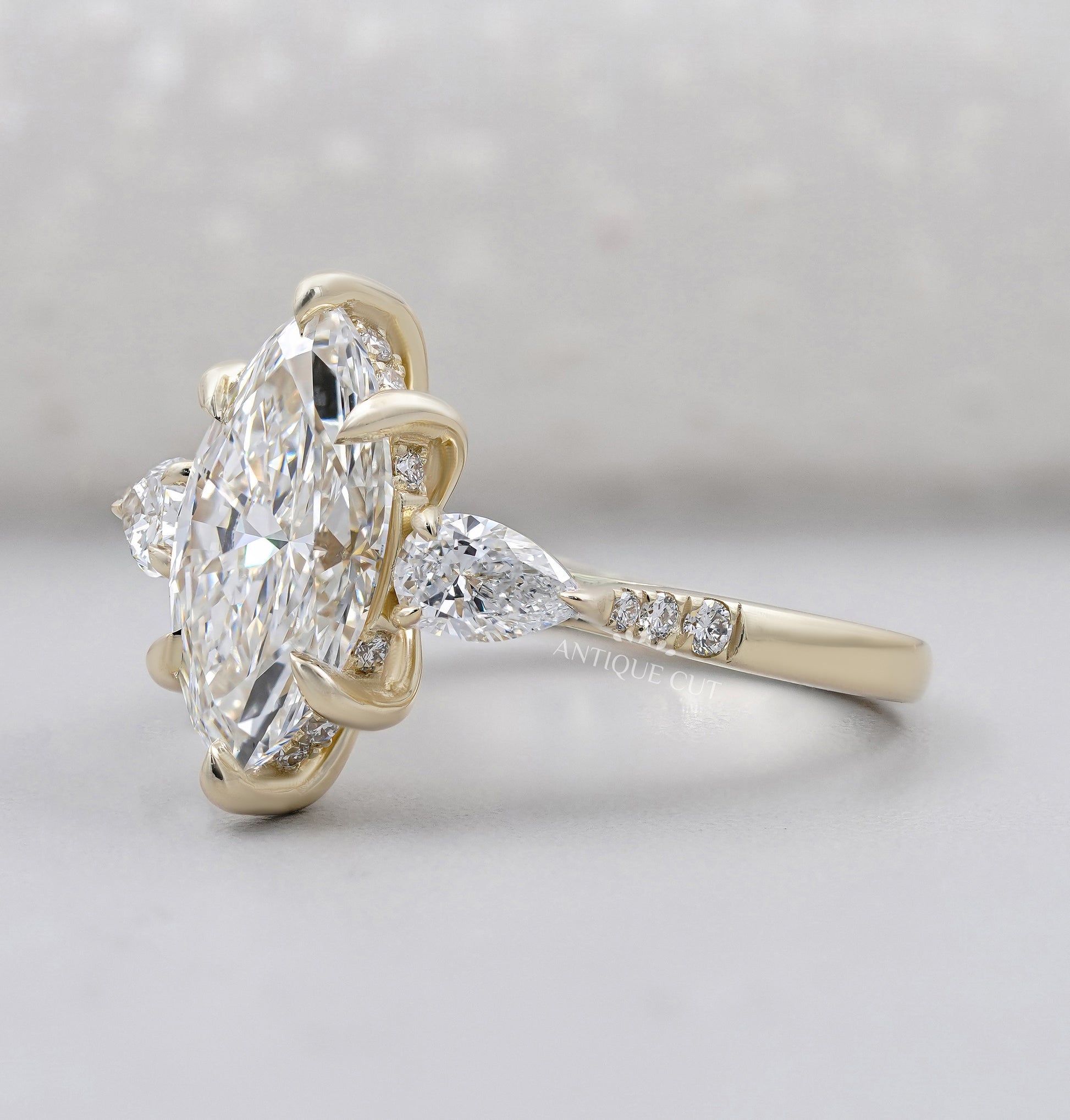 Marquise Cut Engagement Ring with Side Stones