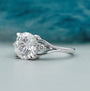 White gold round diamond ring with side diamond accents